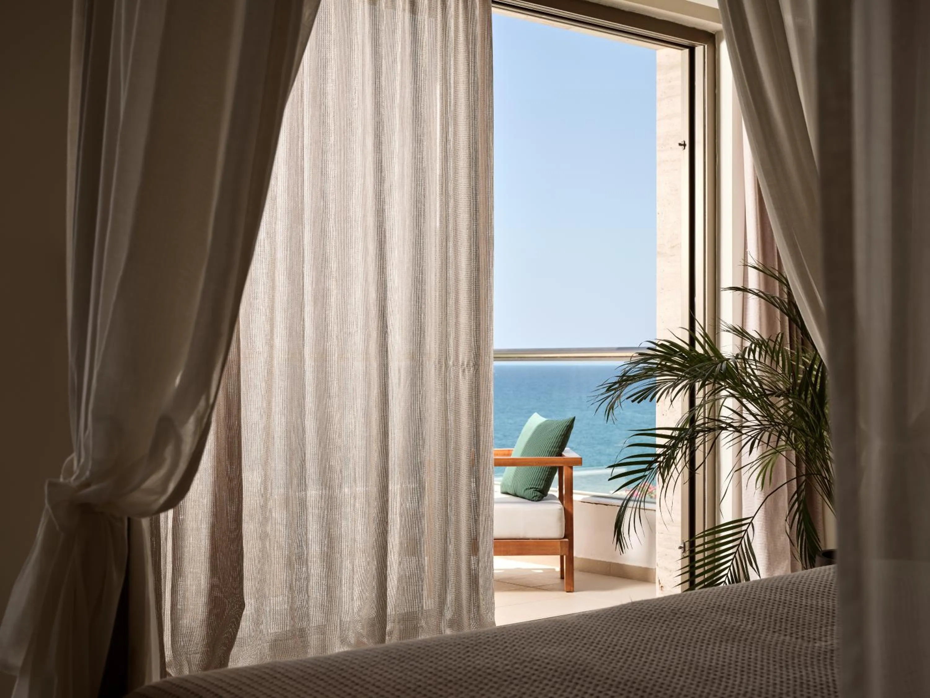 Sea view, Bed in The Royal Blue a Luxury Beach Resort