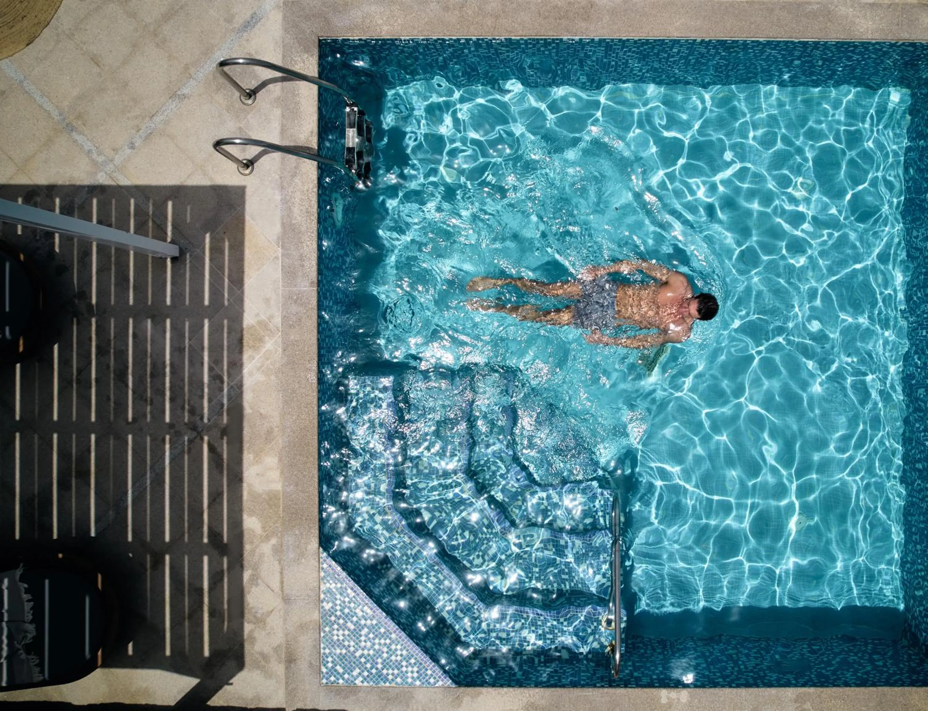Swimming pool in The Royal Blue a Luxury Beach Resort