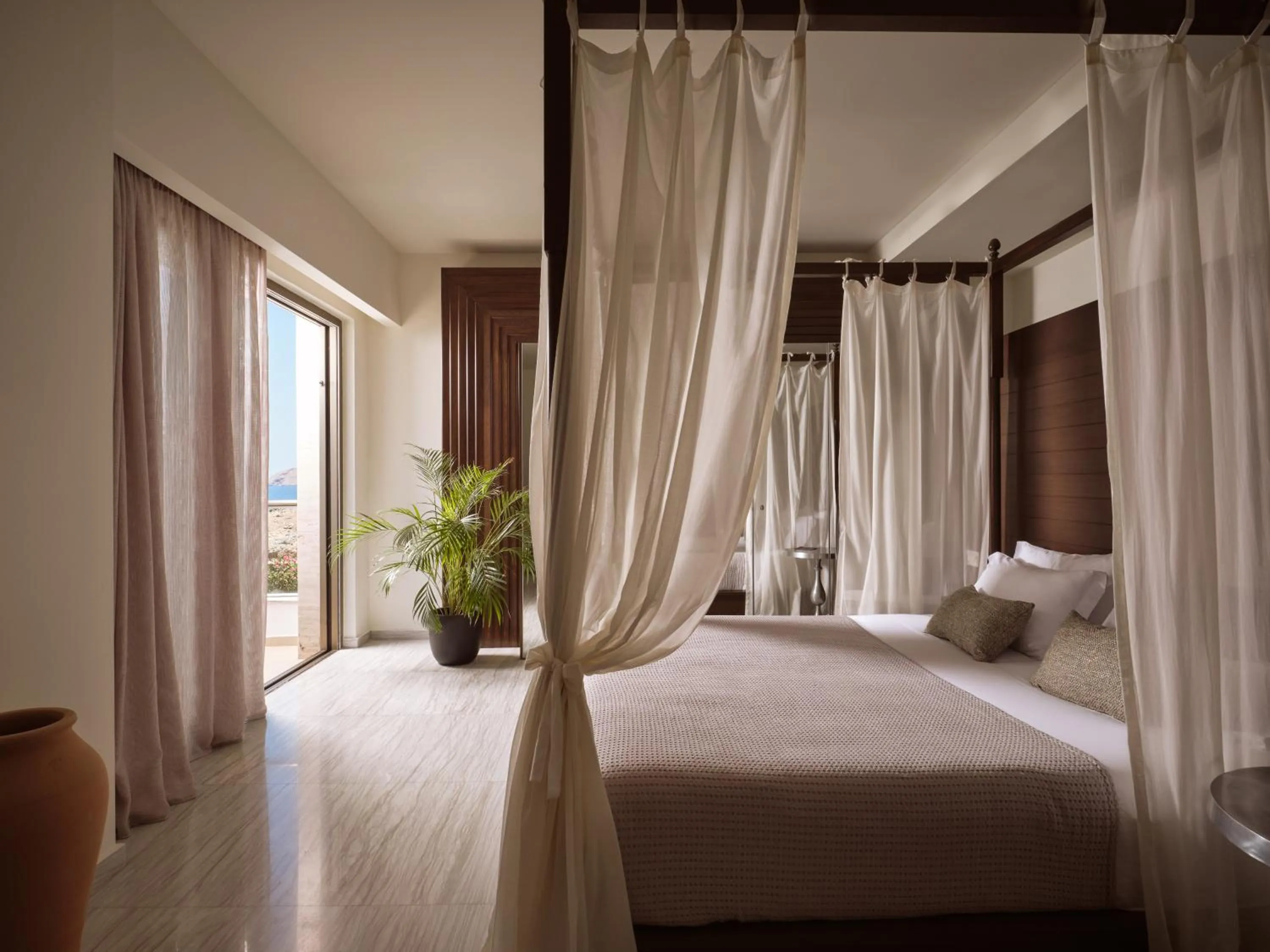 Bedroom, Bed in The Royal Blue a Luxury Beach Resort