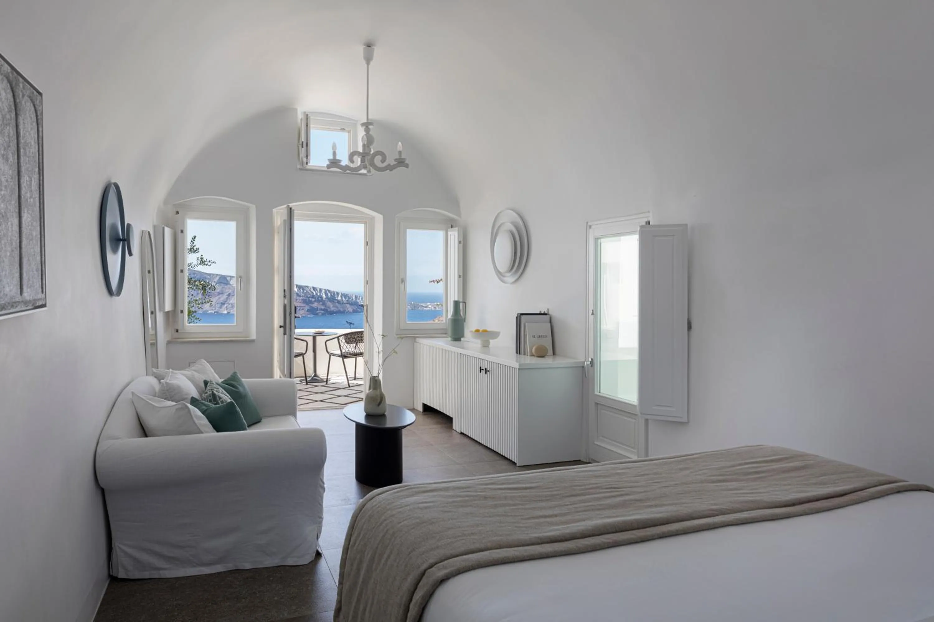 Seating area, Bed in Canaves Oia Suites - Small Luxury Hotels of the World