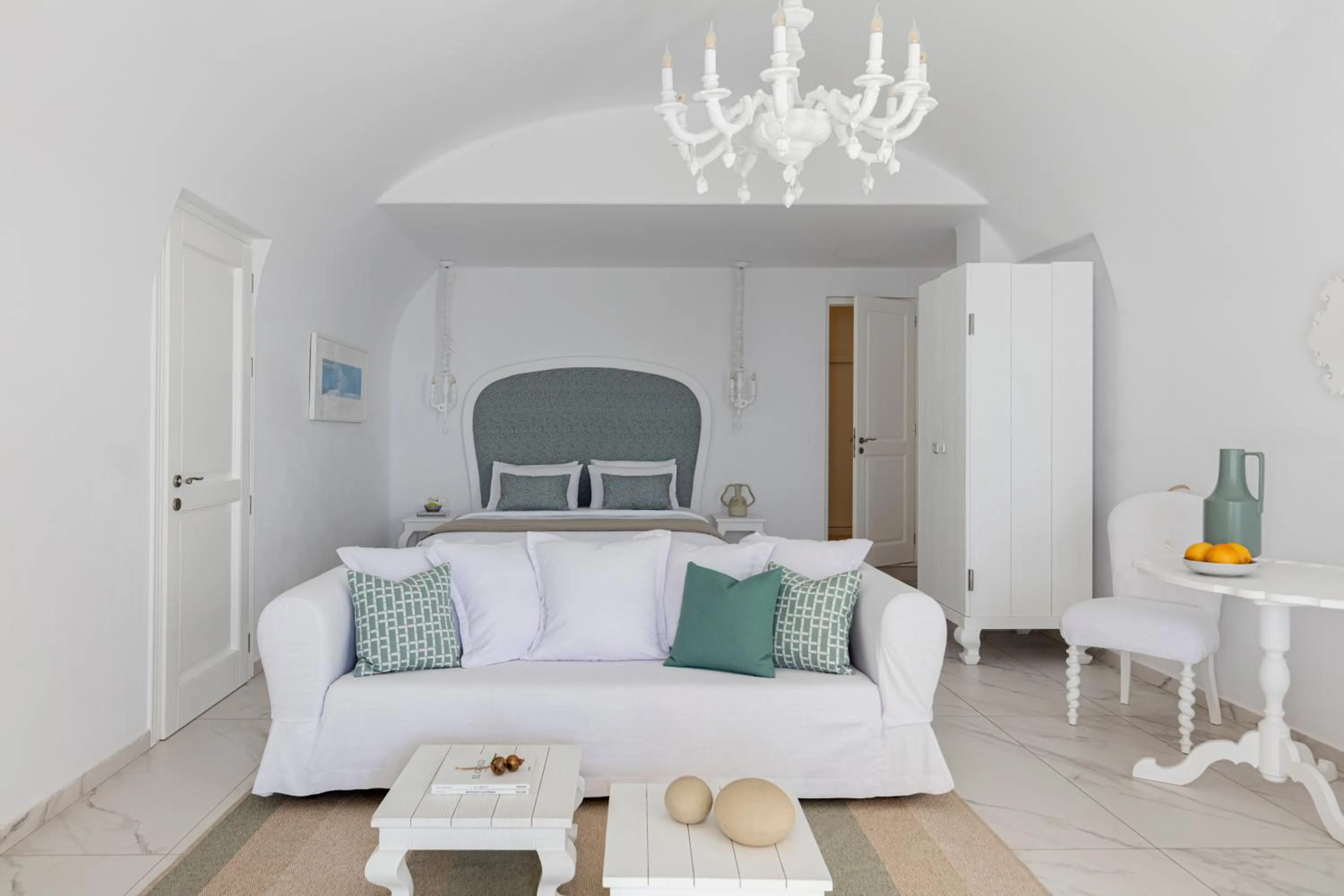 Living room, Bed in Canaves Oia Suites - Small Luxury Hotels of the World