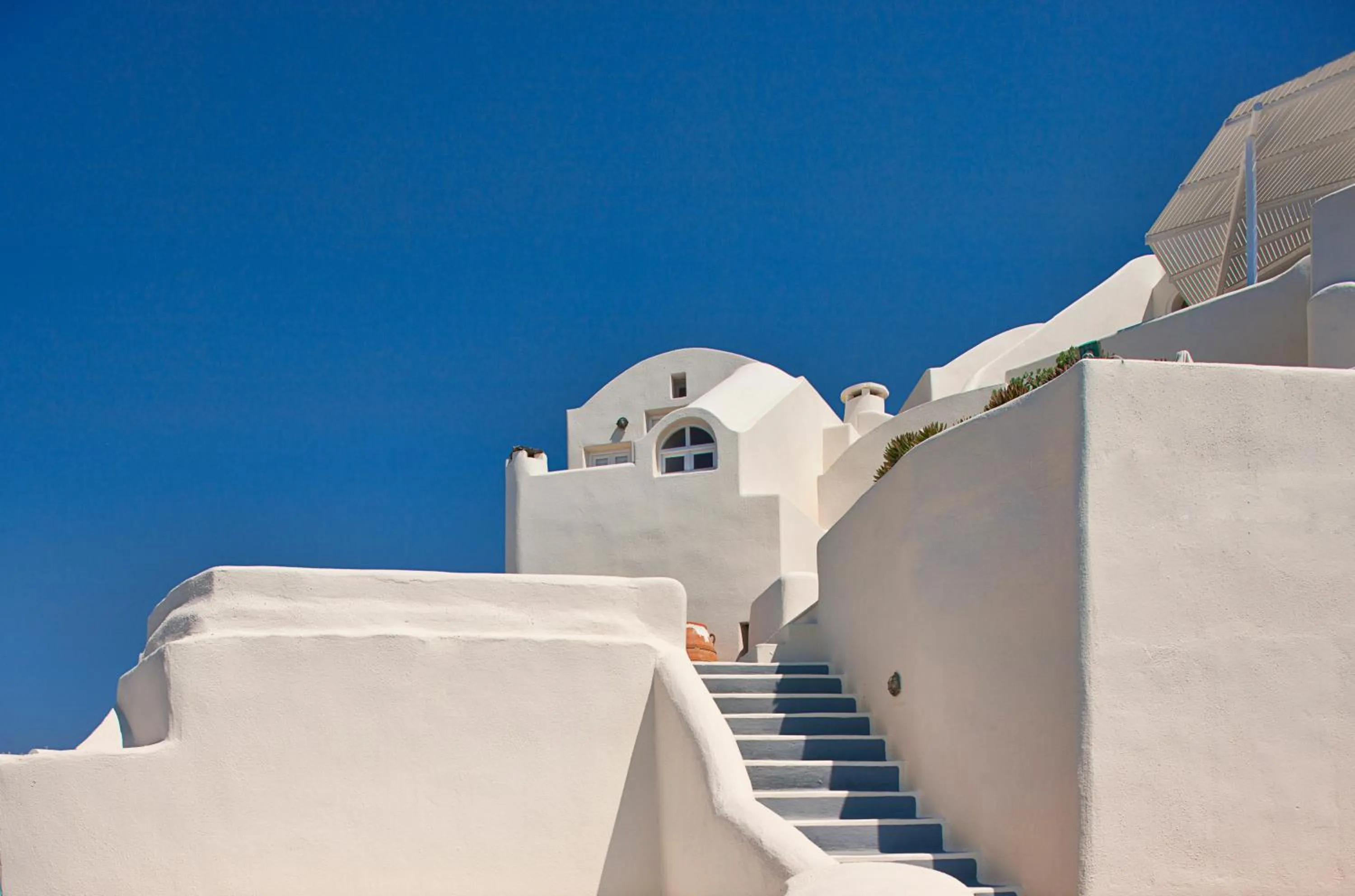 Property building in Canaves Oia Suites - Small Luxury Hotels of the World