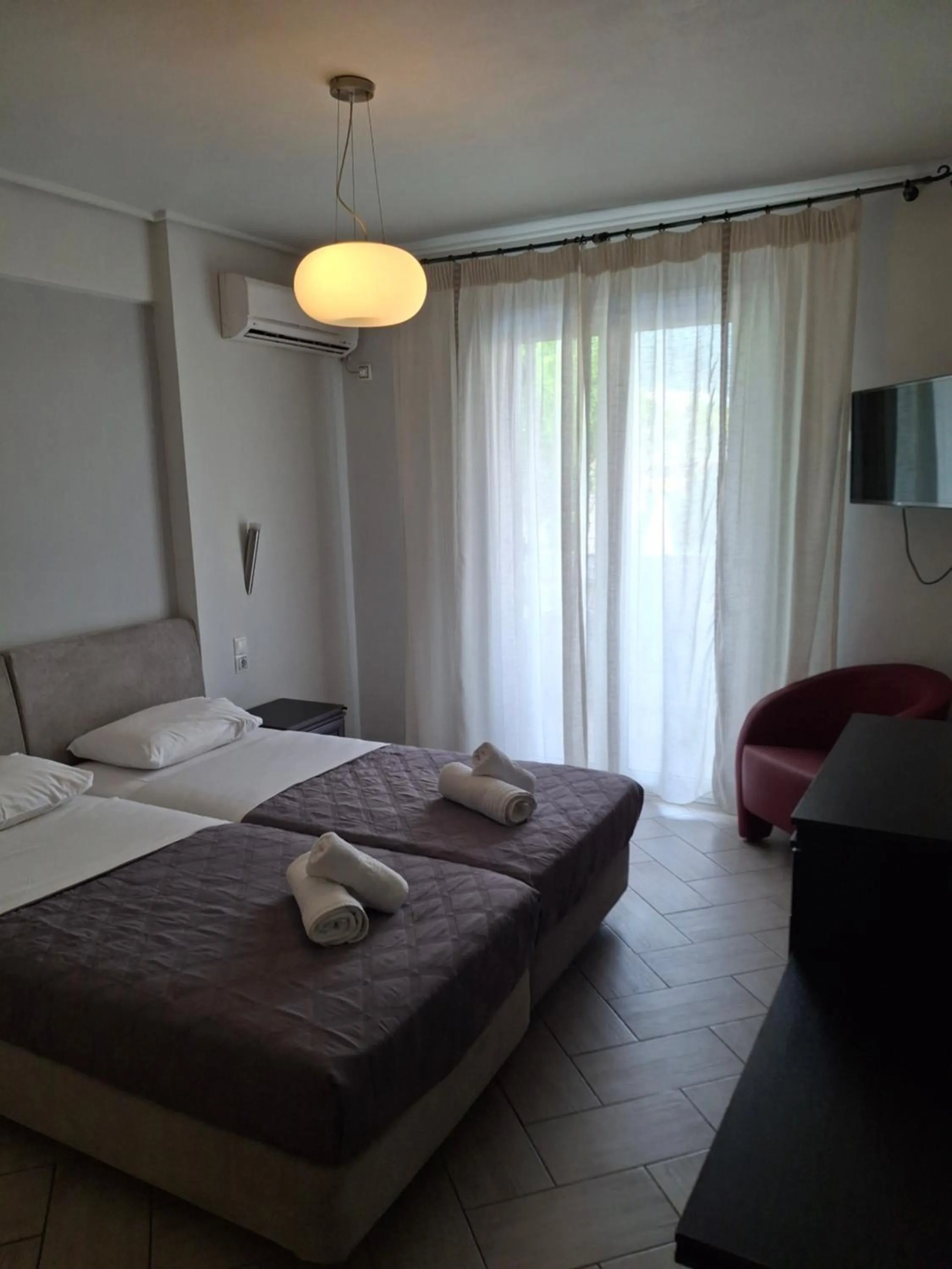 Bed in Palmyra Hotel