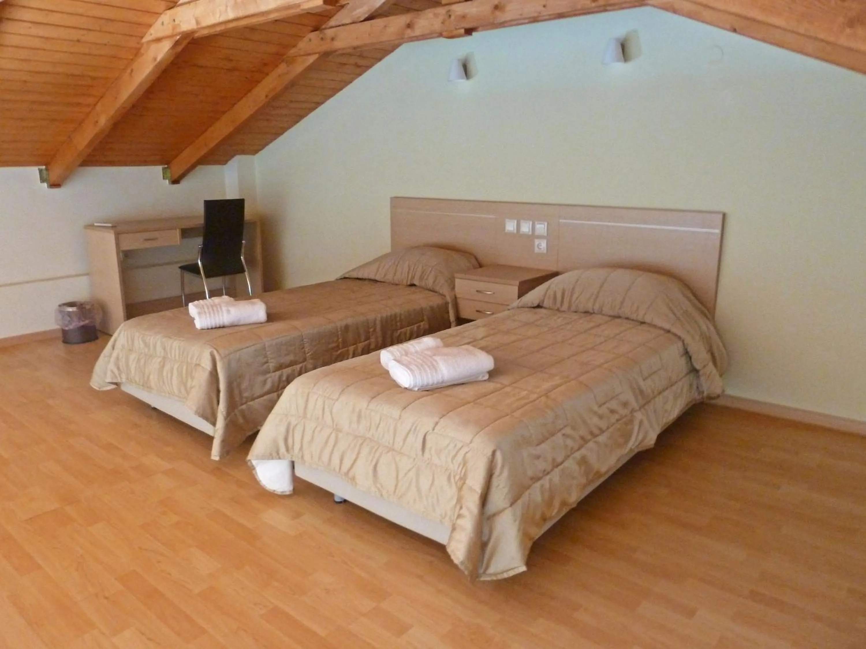 Bed in Eleana Boutique Hotel & Blue Infinity