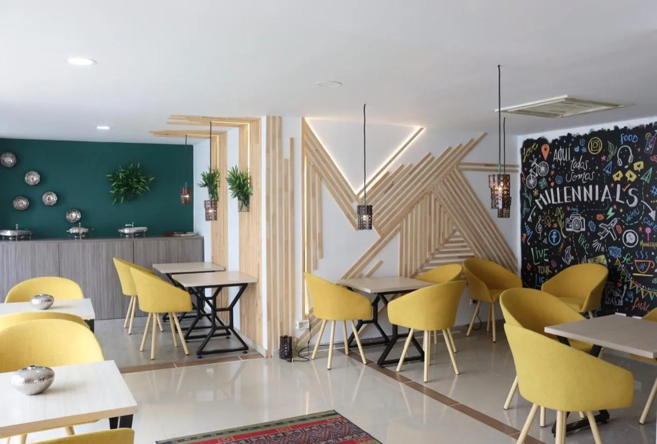 Restaurant/places to eat in Apartahotel Millennials