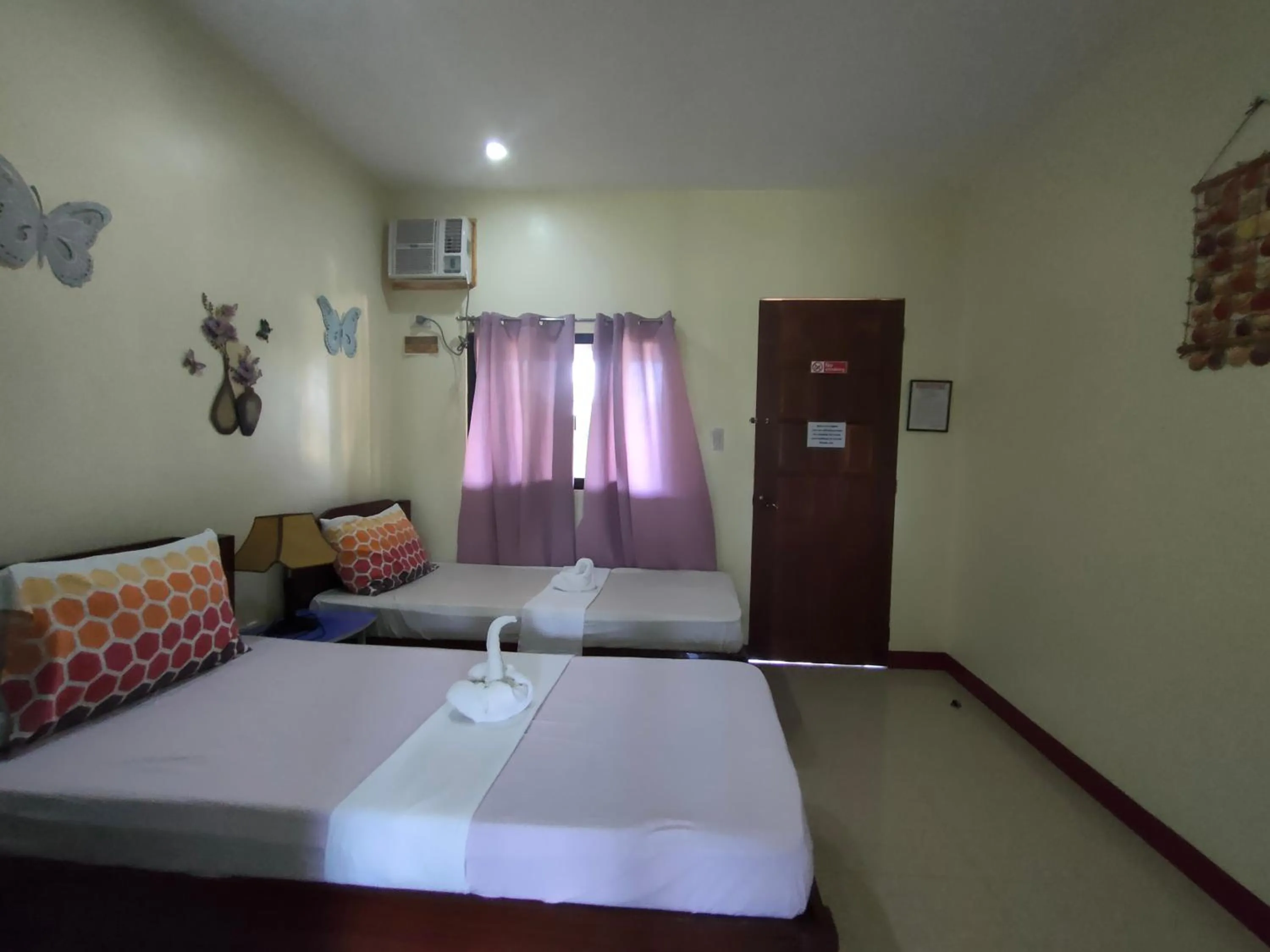 Photo of the whole room in SUNSHINE PARADISE Inn