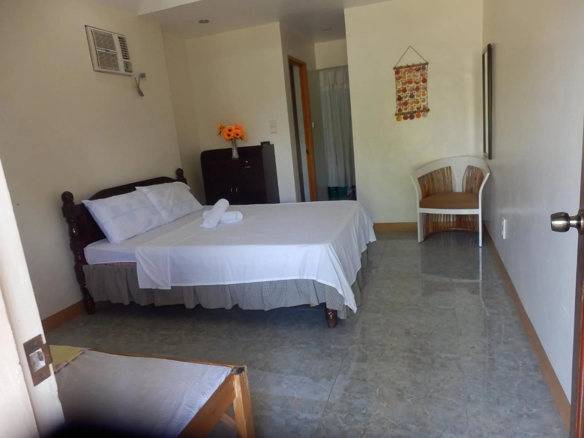 Bed in SUNSHINE PARADISE Inn