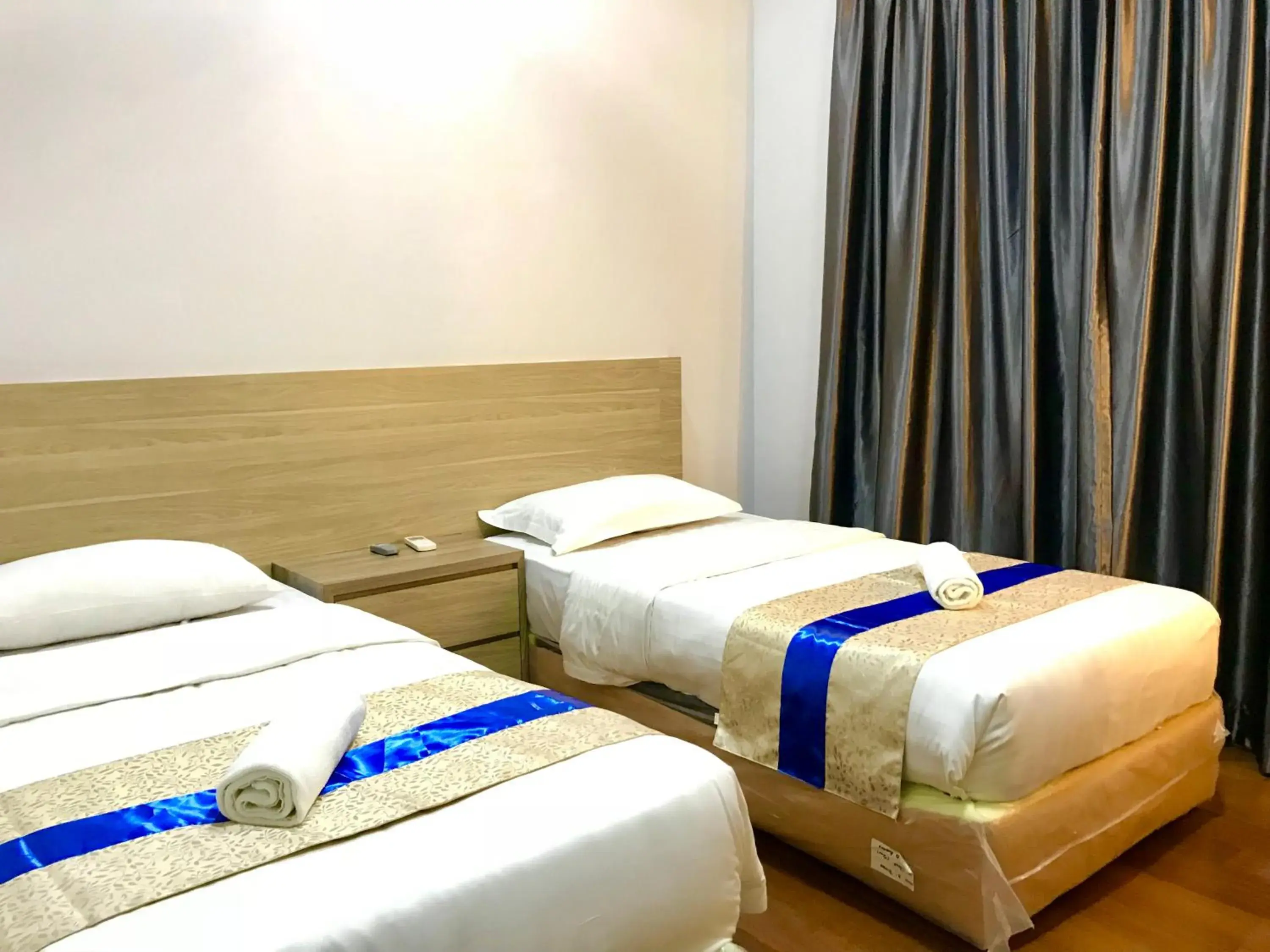 Bedroom, Bed in Sunset Seaview Vacation Condos @ IMAGO Shopping Mall Bedroom, Bed in Sunset Seaview Vacation Condos @ IMAGO Shopping Mall