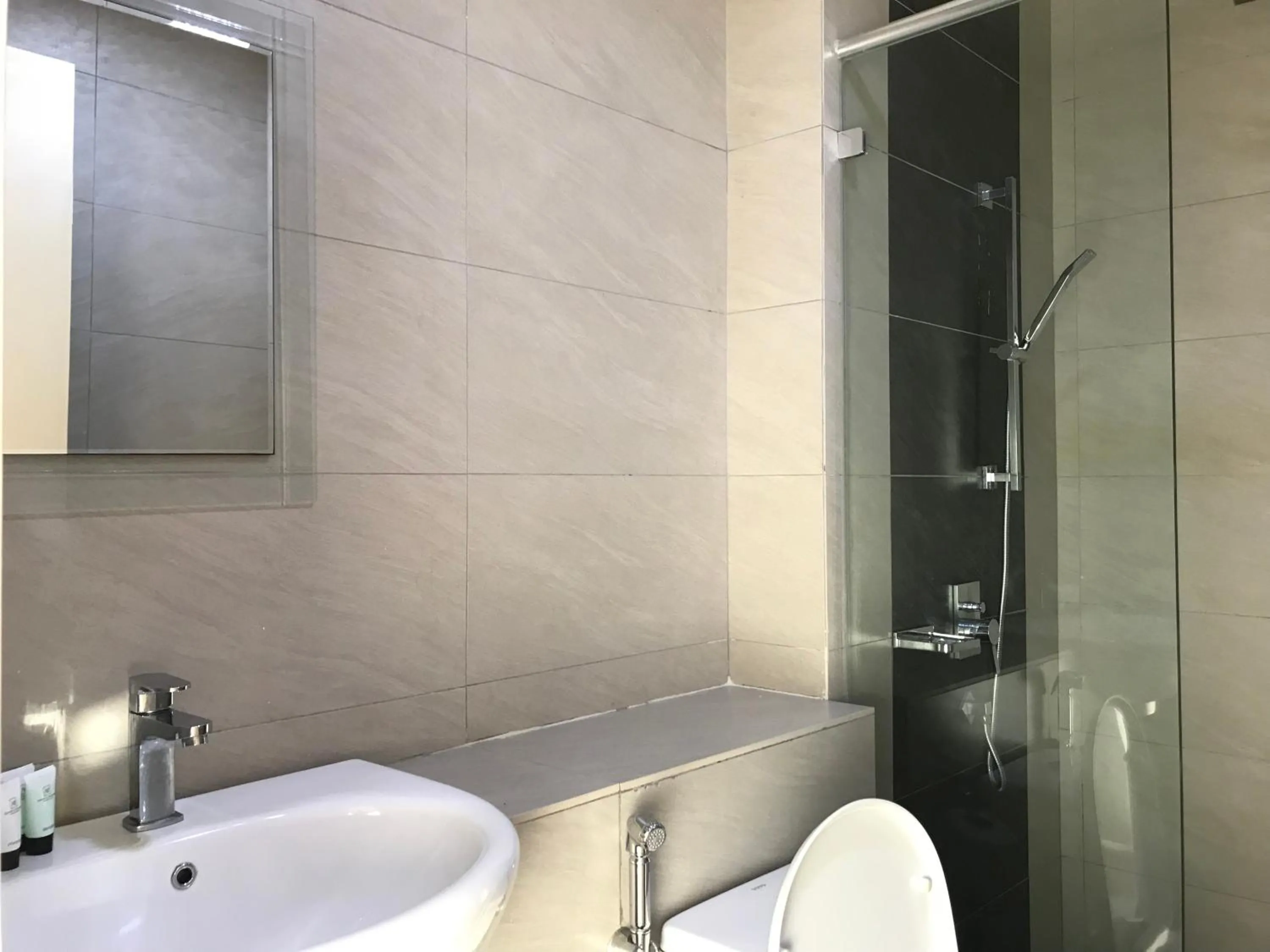 Bathroom in Sunset Seaview Vacation Condos @ IMAGO Shopping Mall