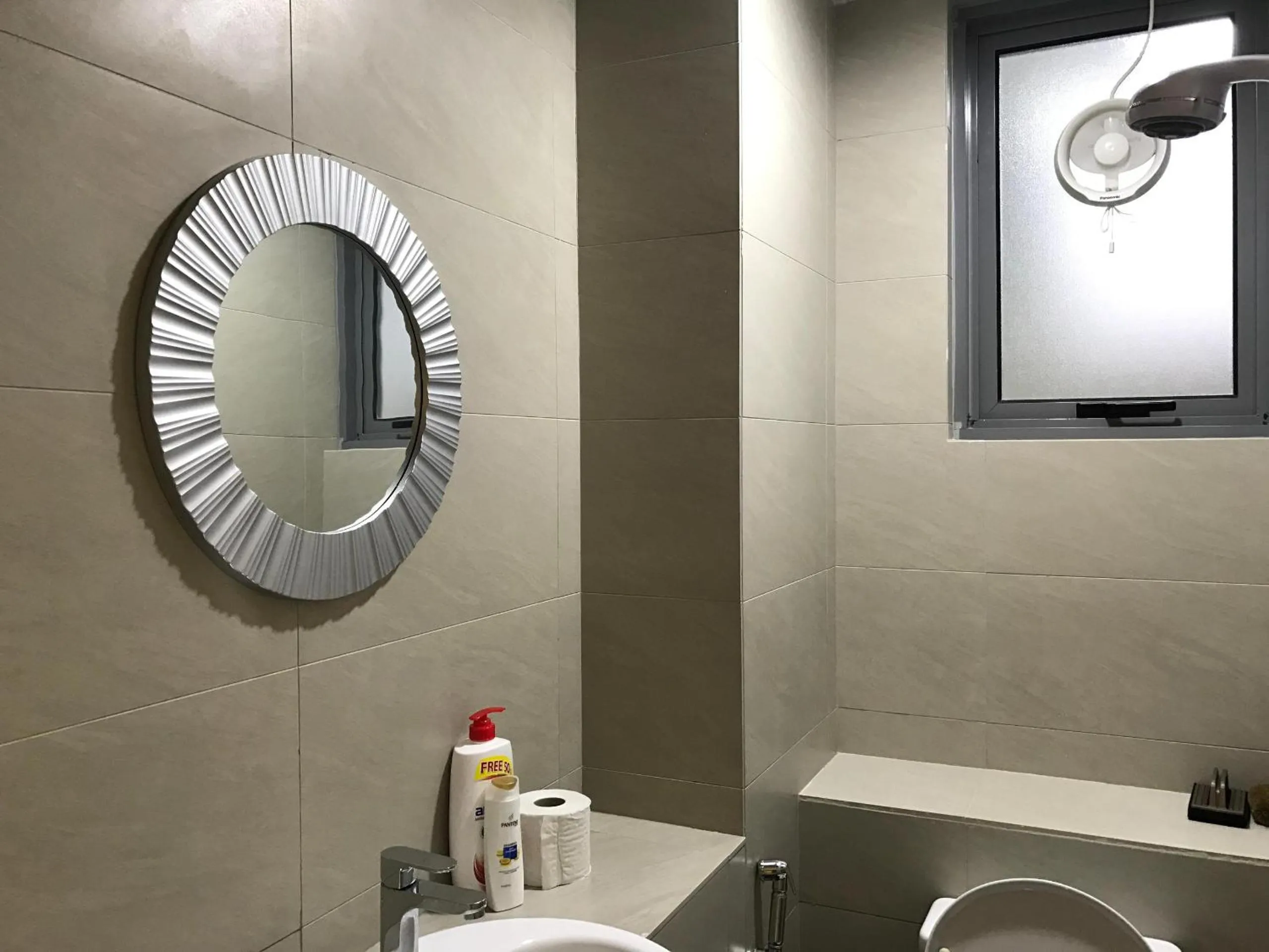 Bathroom in Sunset Seaview Vacation Condos @ IMAGO Shopping Mall