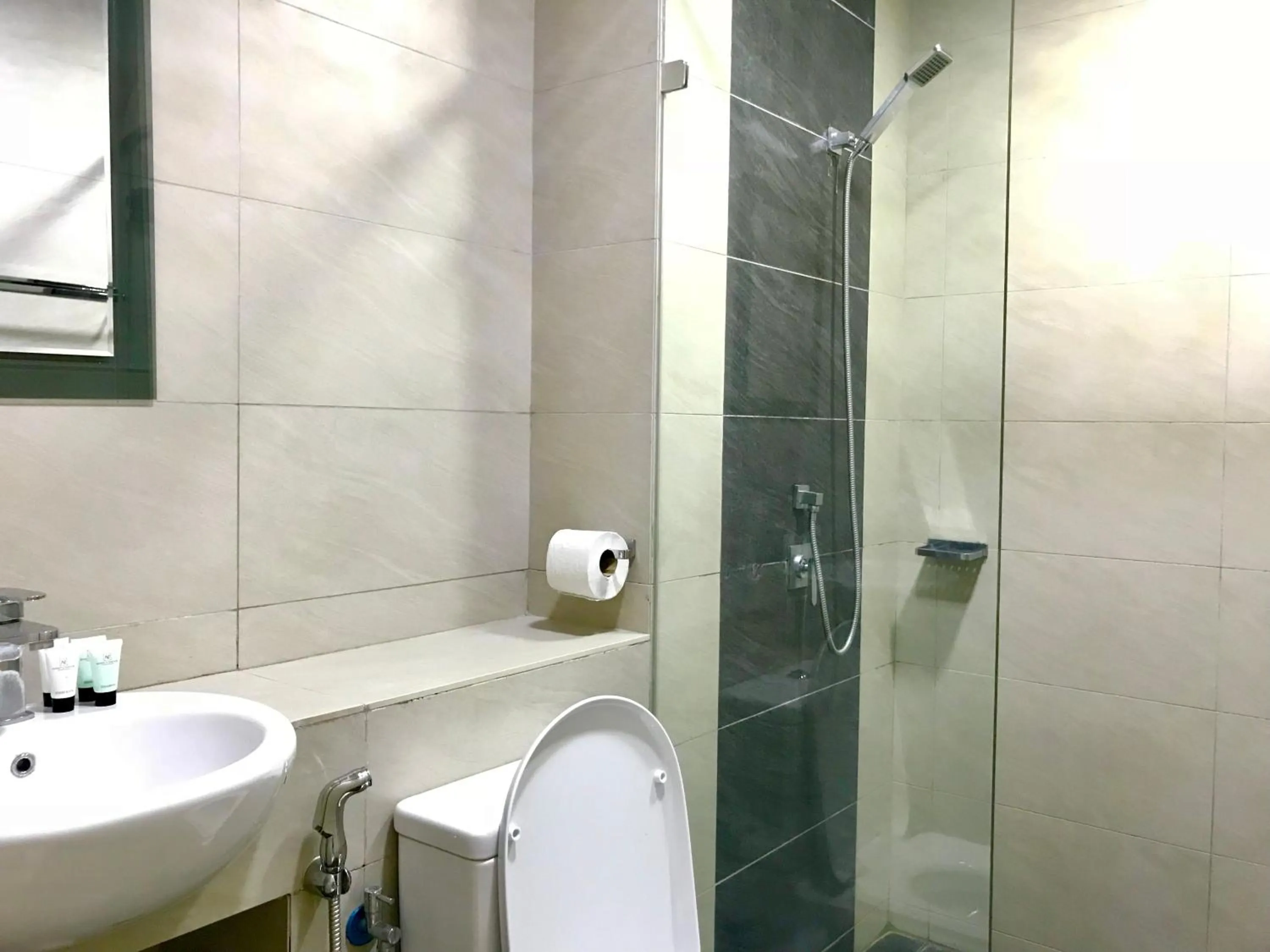 Bathroom in Sunset Seaview Vacation Condos @ IMAGO Shopping Mall