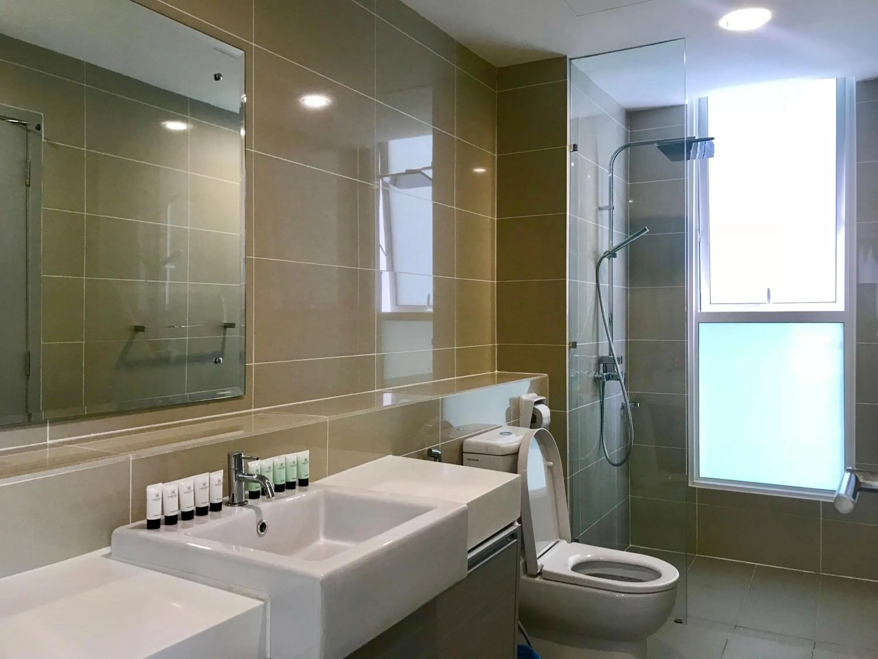 Bathroom in Sunset Seaview Vacation Condos @ IMAGO Shopping Mall