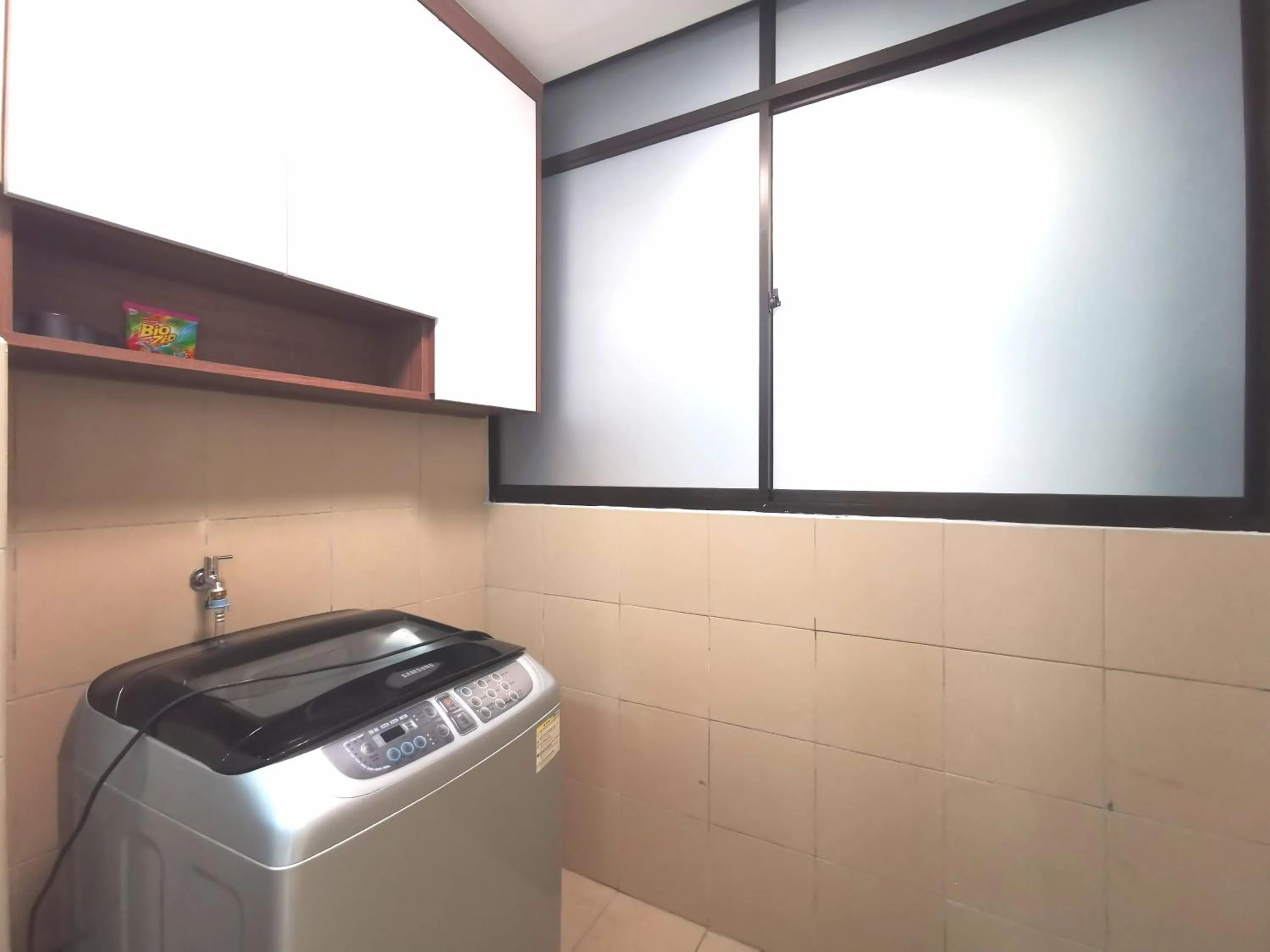 washing machine in Sunset Seaview Vacation Condos @ IMAGO Shopping Mall