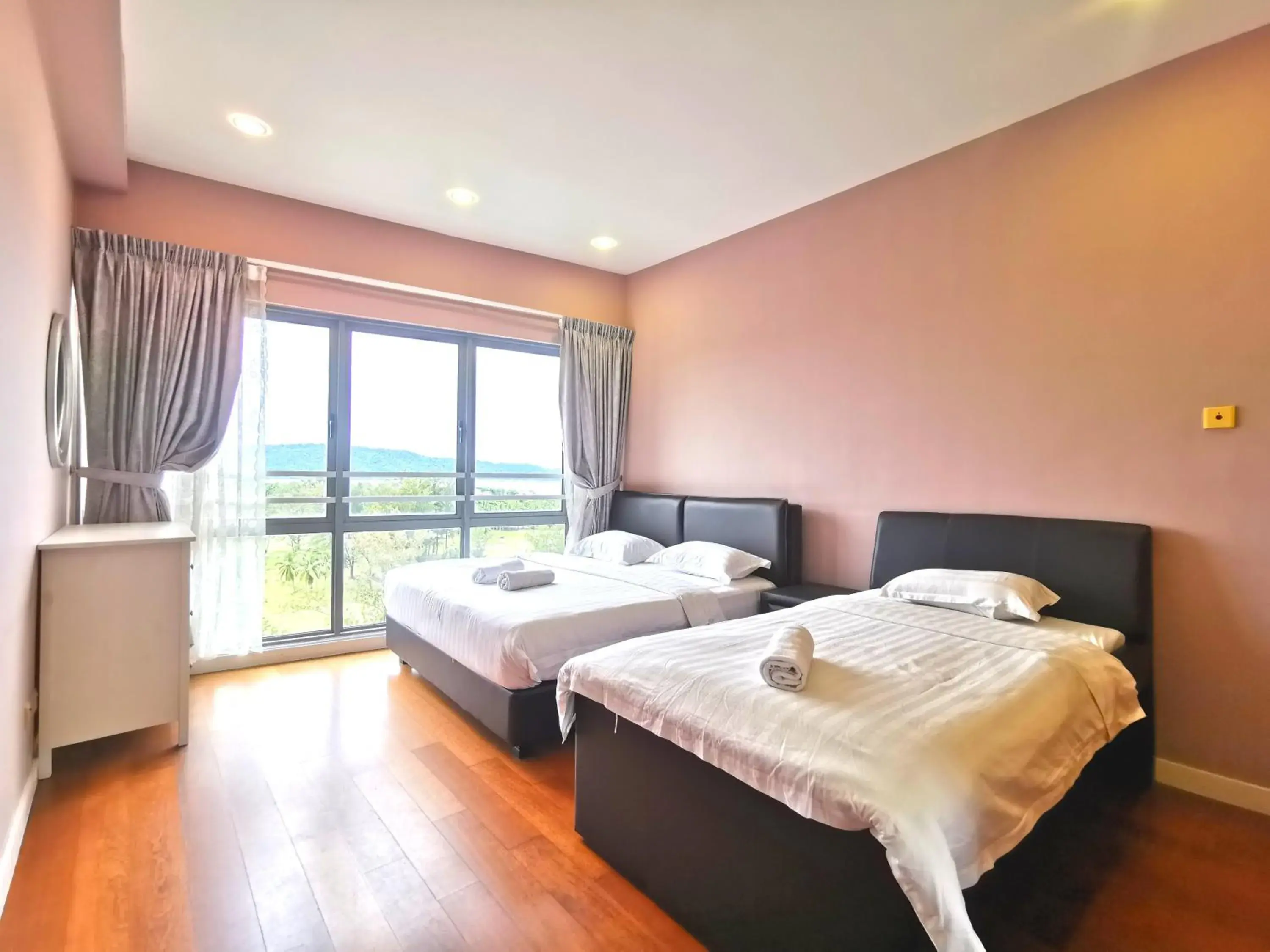 Bed in Sunset Seaview Vacation Condos @ IMAGO Shopping Mall Bed in Sunset Seaview Vacation Condos @ IMAGO Shopping Mall