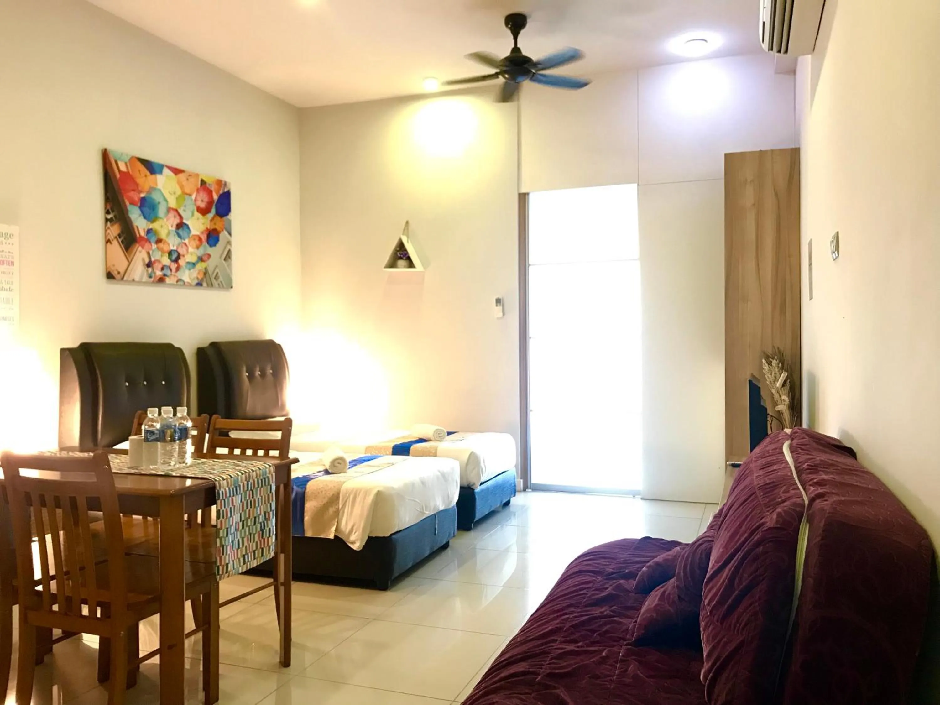 Living room, Bed in Sunset Seaview Vacation Condos @ IMAGO Shopping Mall