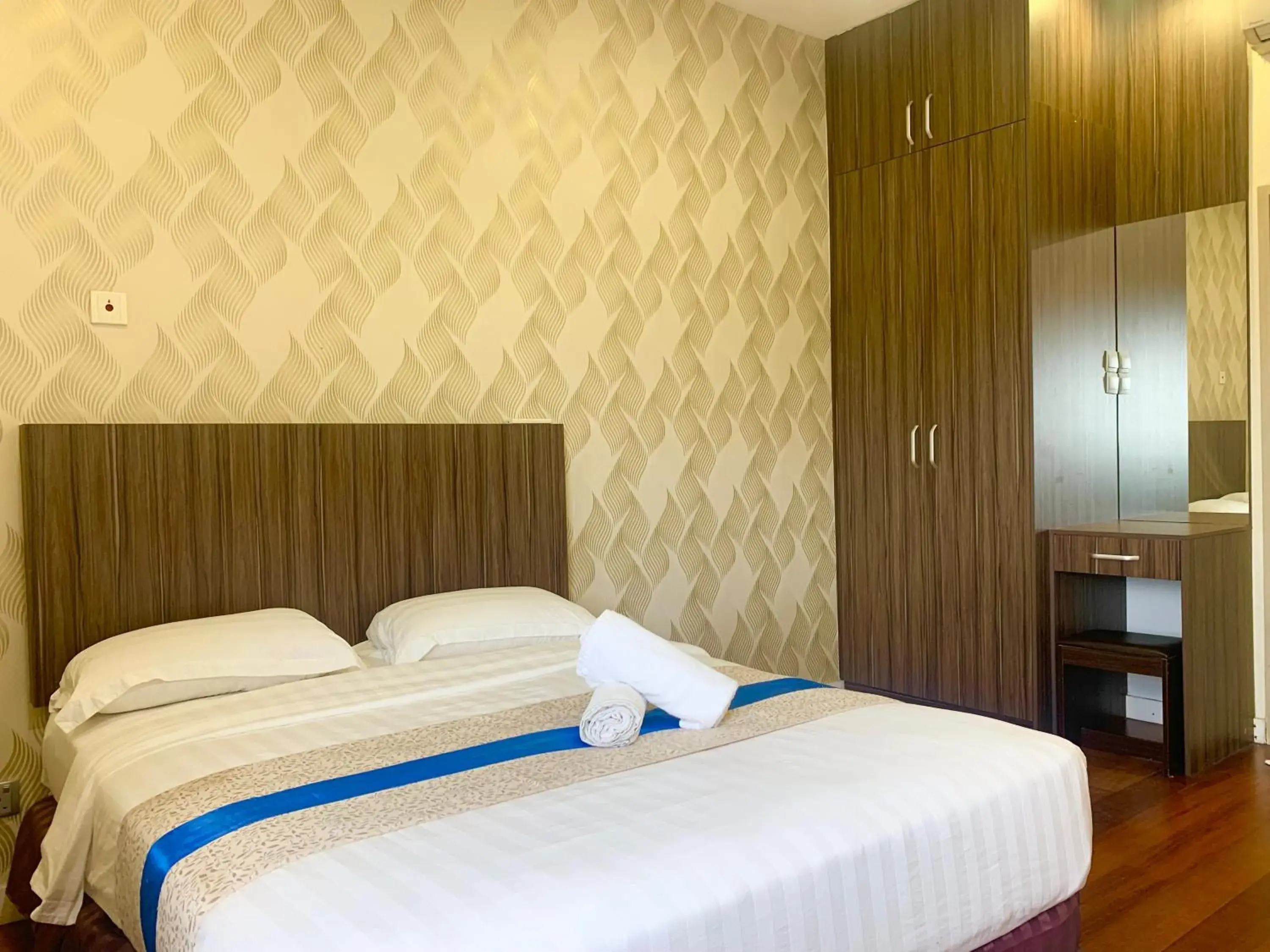 Bed in Sunset Seaview Vacation Condos @ IMAGO Shopping Mall Bed in Sunset Seaview Vacation Condos @ IMAGO Shopping Mall