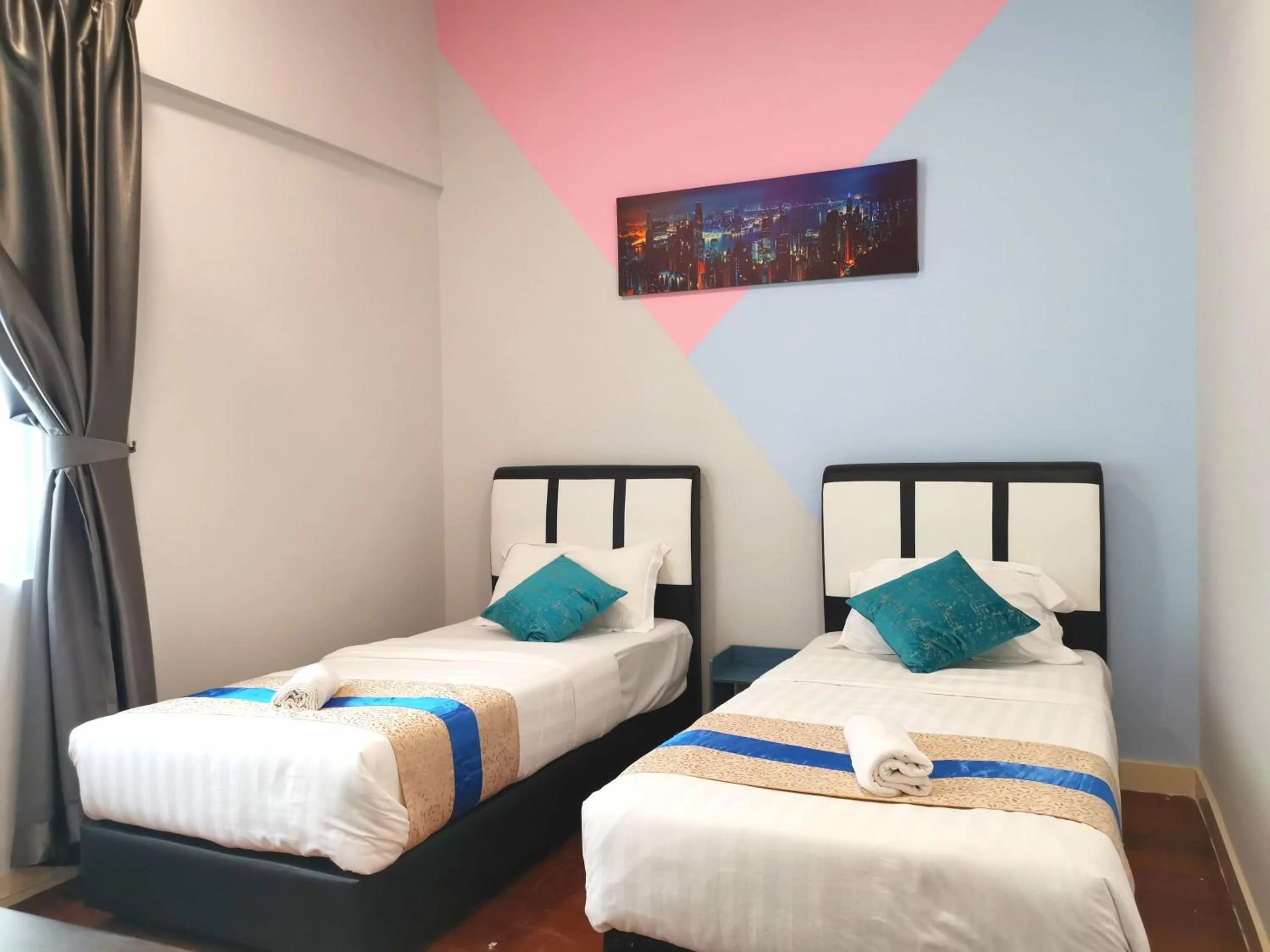 Bed in Sunset Seaview Vacation Condos @ IMAGO Shopping Mall