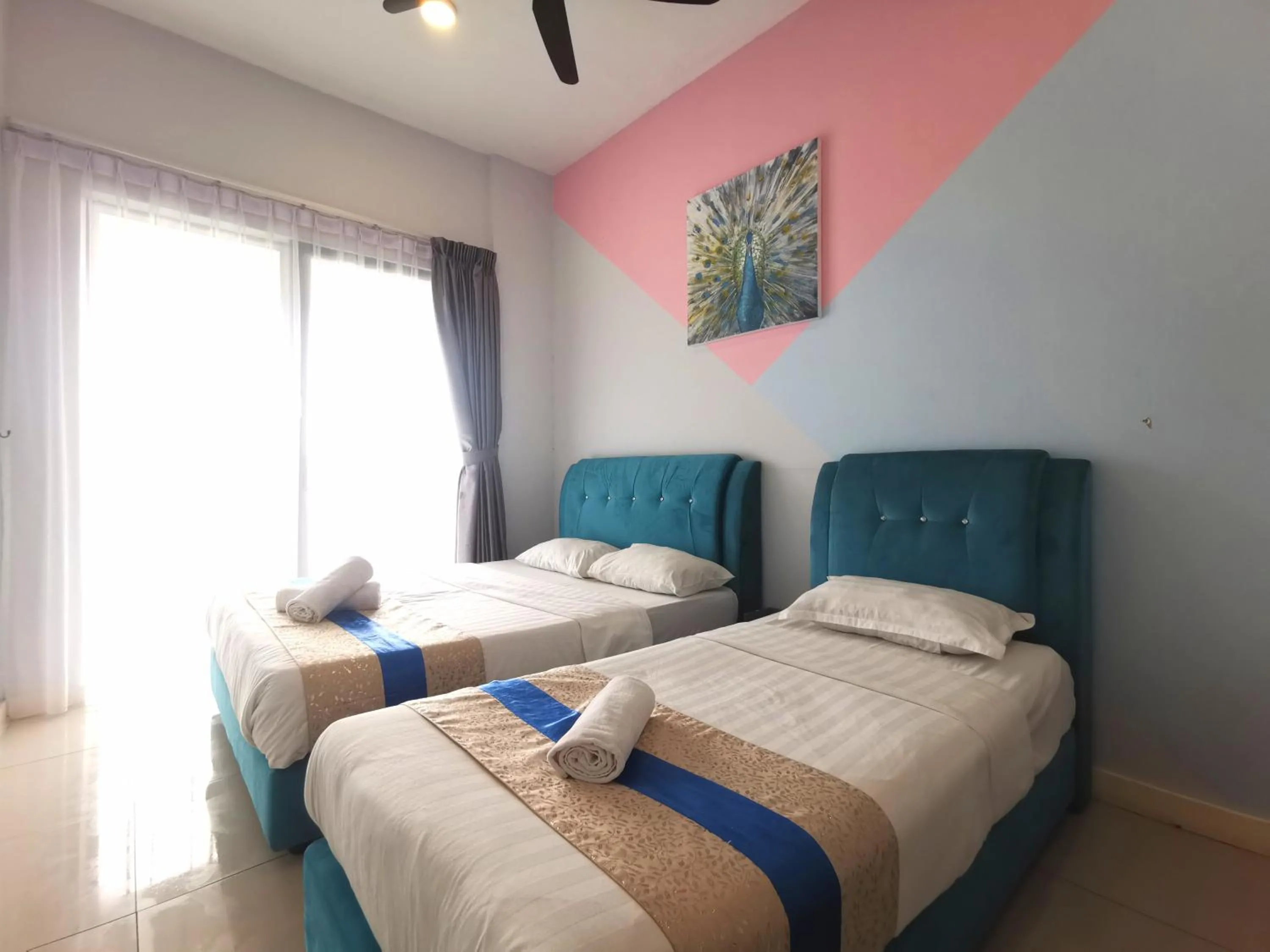 Bed in Sunset Seaview Vacation Condos @ IMAGO Shopping Mall