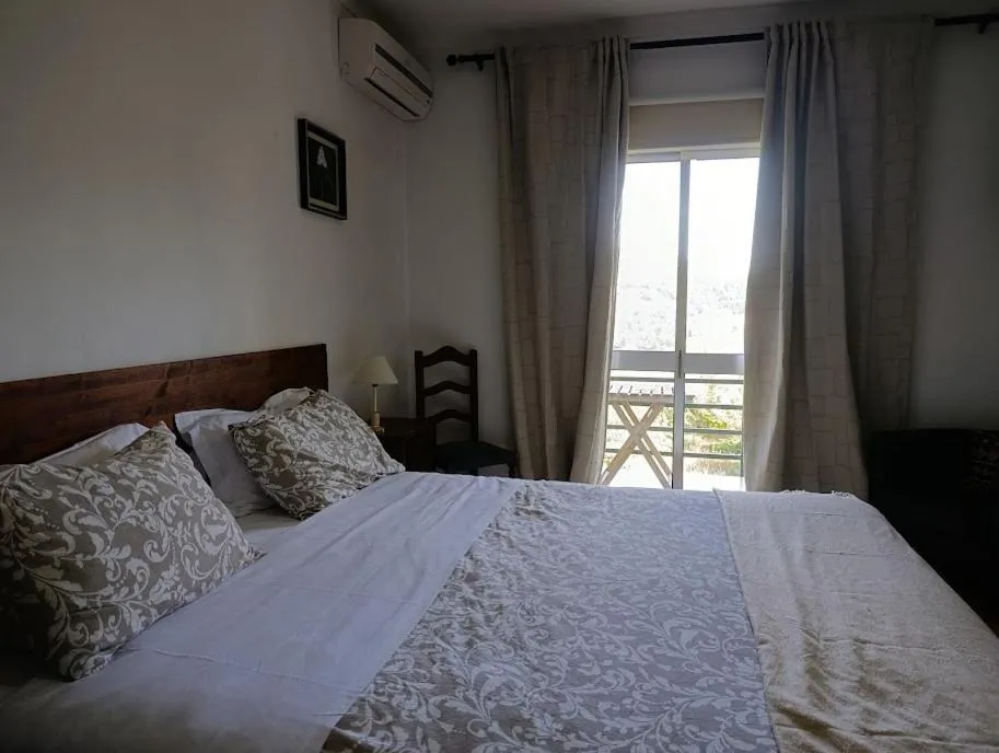 Bed in Residencial Do Rita em Rio Caldo
