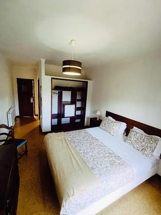 Toilet, Bed in Residencial Do Rita em Rio Caldo