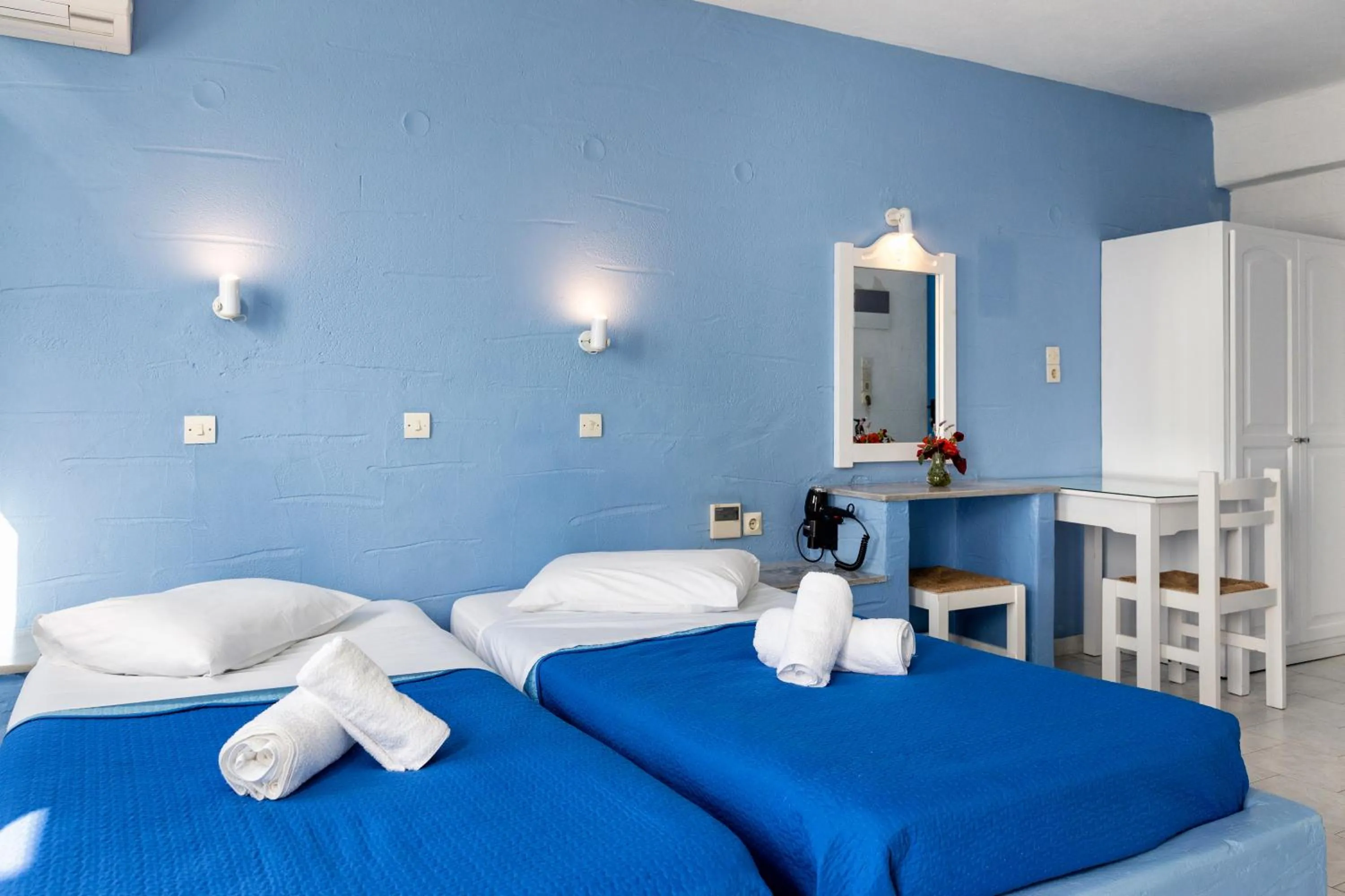 Bed in Stratos Apartments & Studios