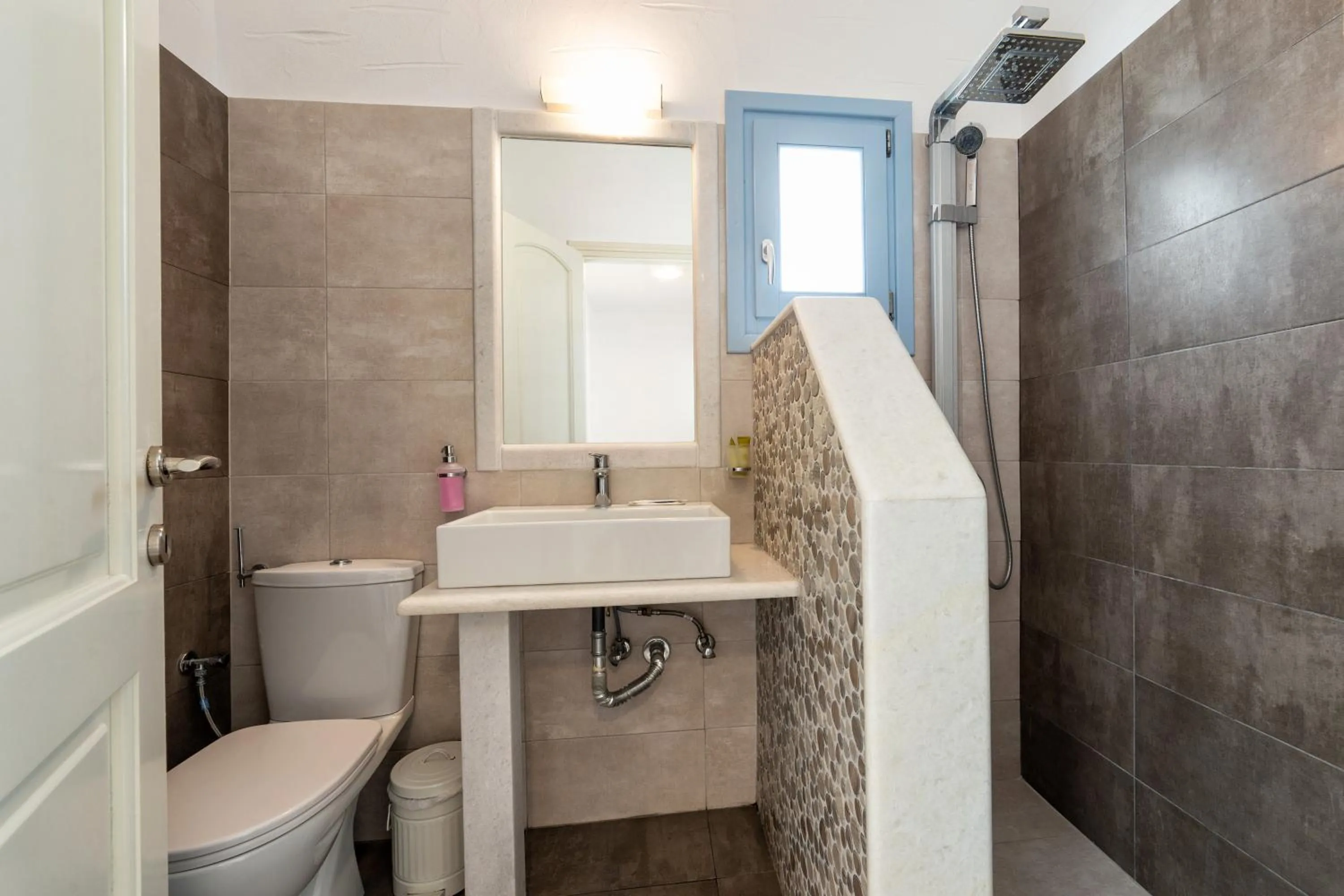 Toilet in Stratos Apartments & Studios