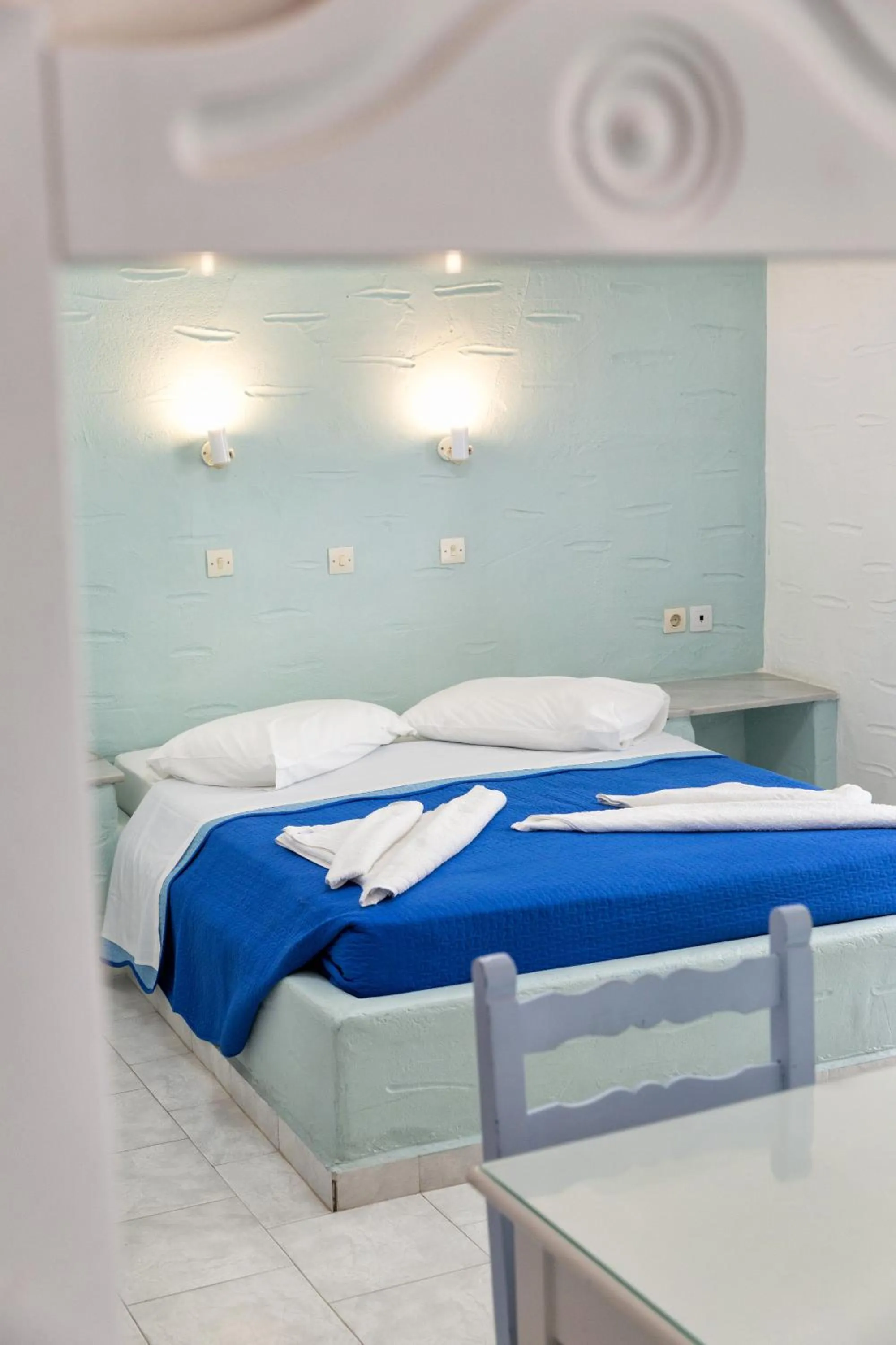 Bed in Stratos Apartments & Studios