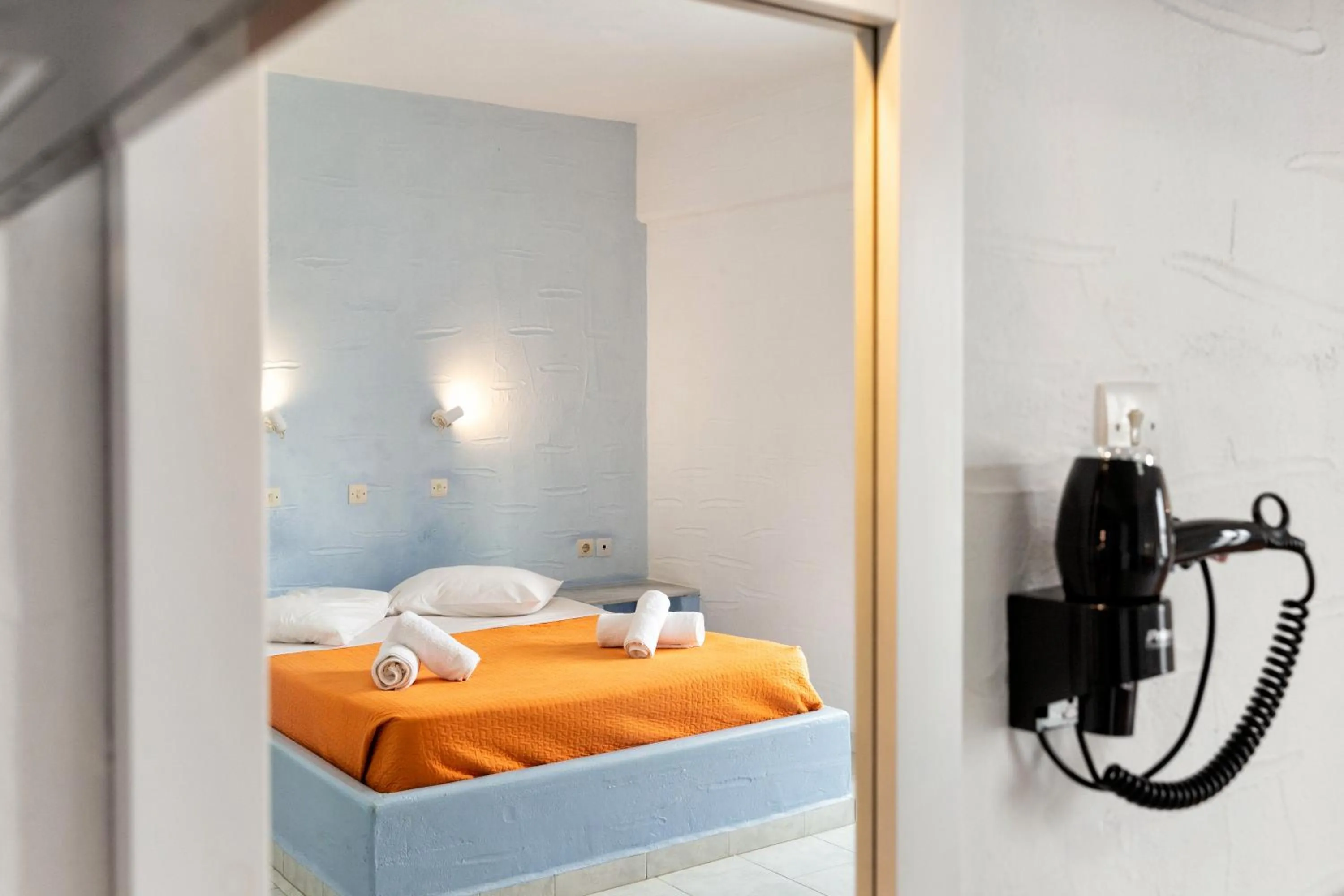 Bed in Stratos Apartments & Studios