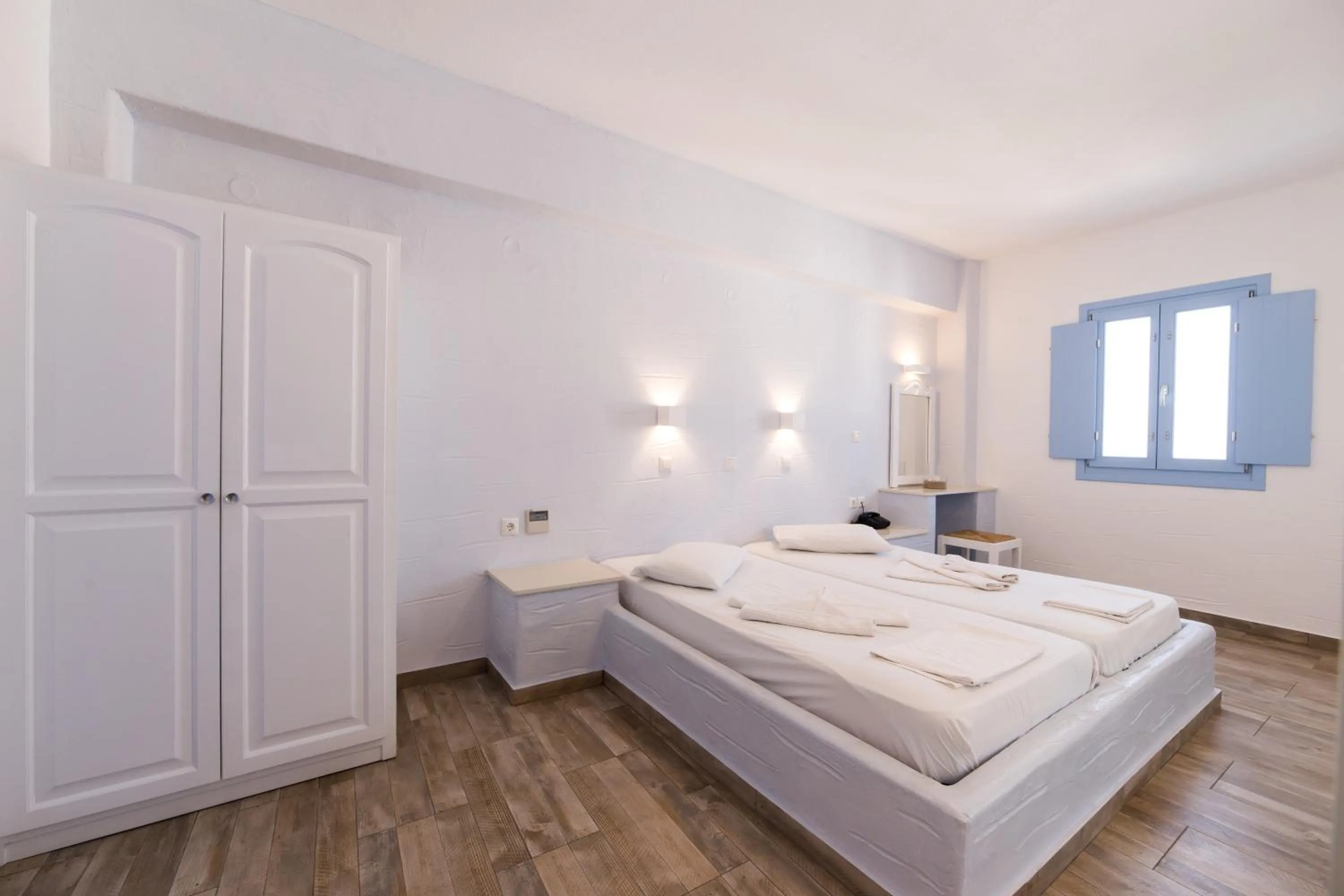 Bed in Stratos Apartments & Studios