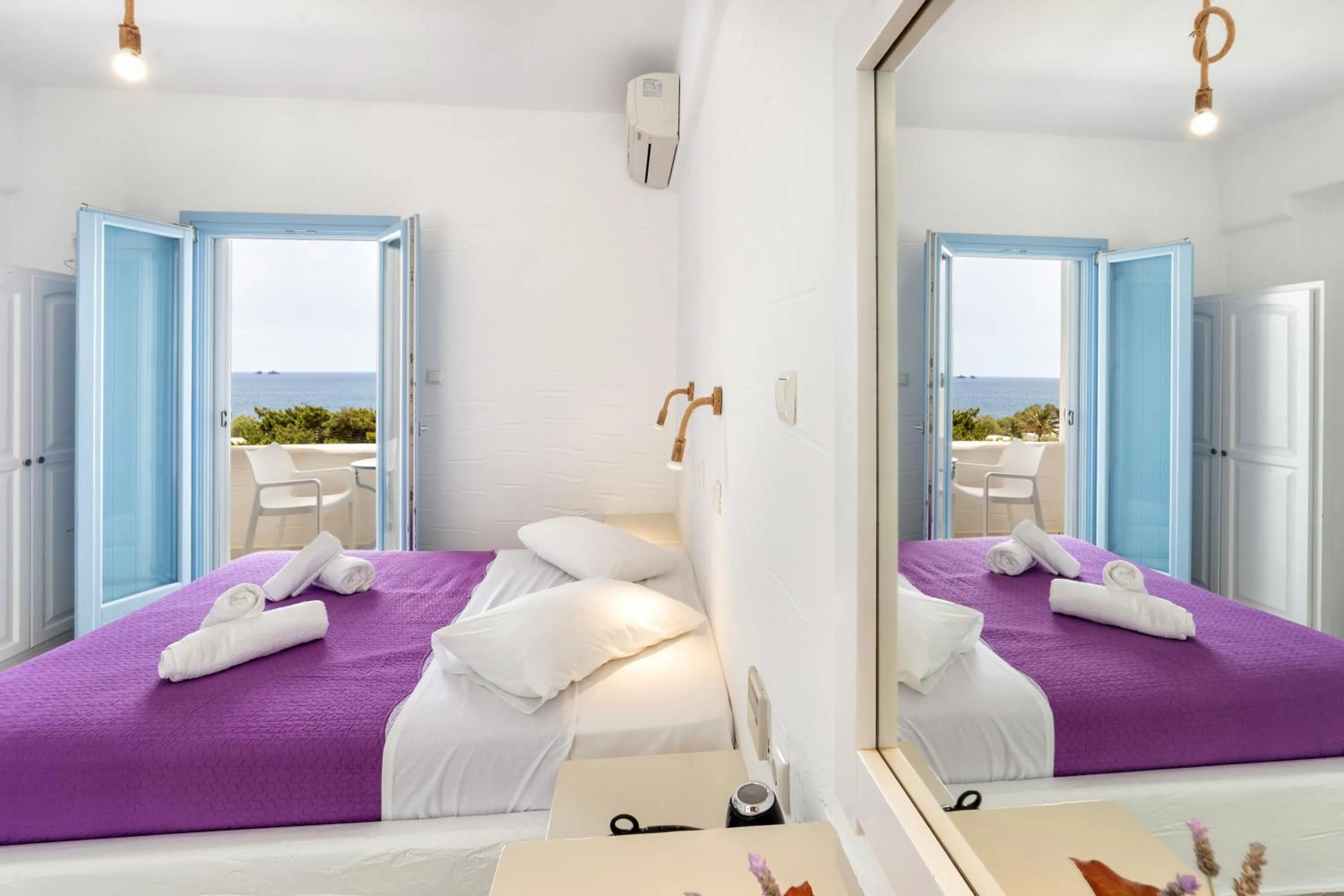 Bed in Stratos Apartments & Studios