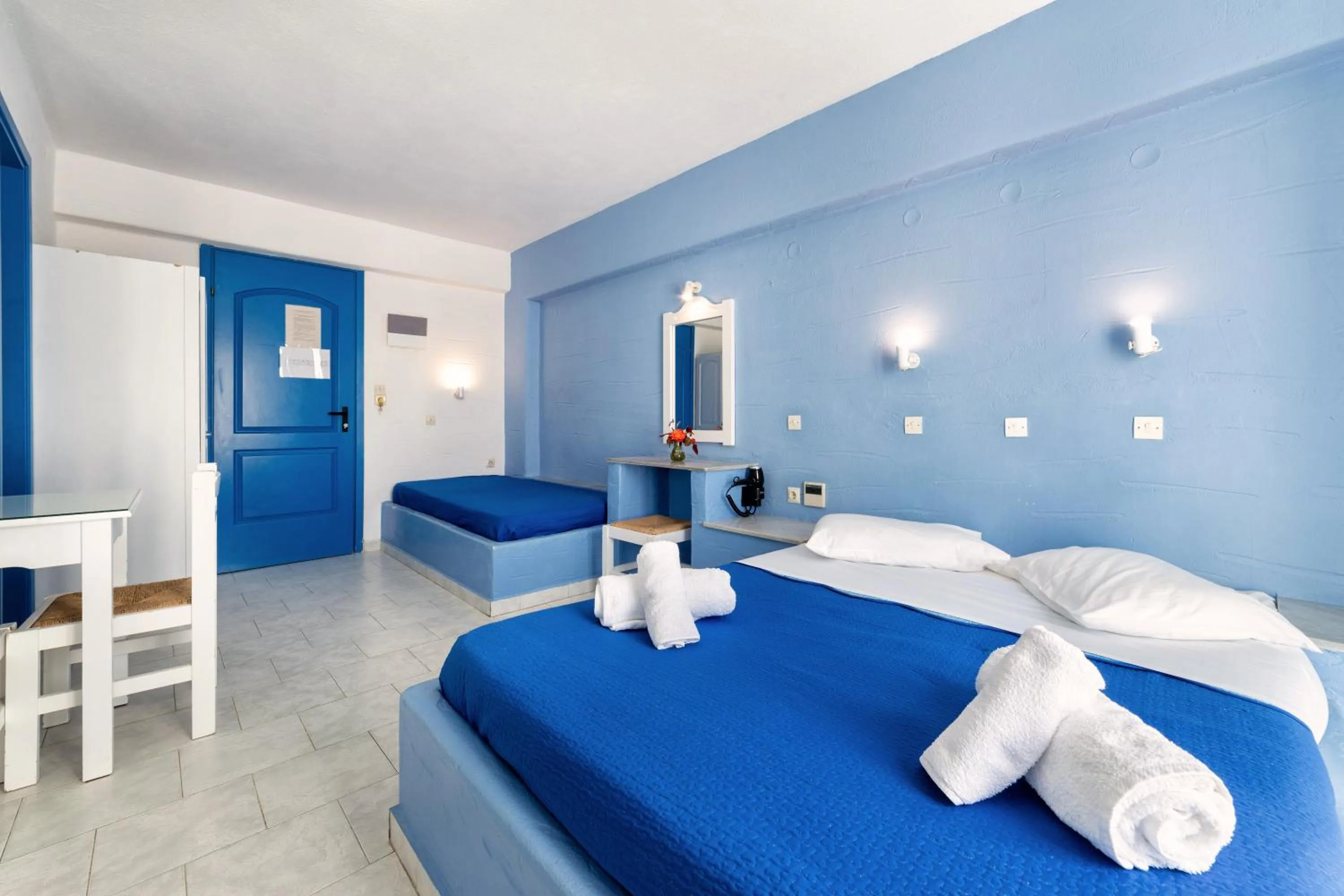 Bed in Stratos Apartments & Studios