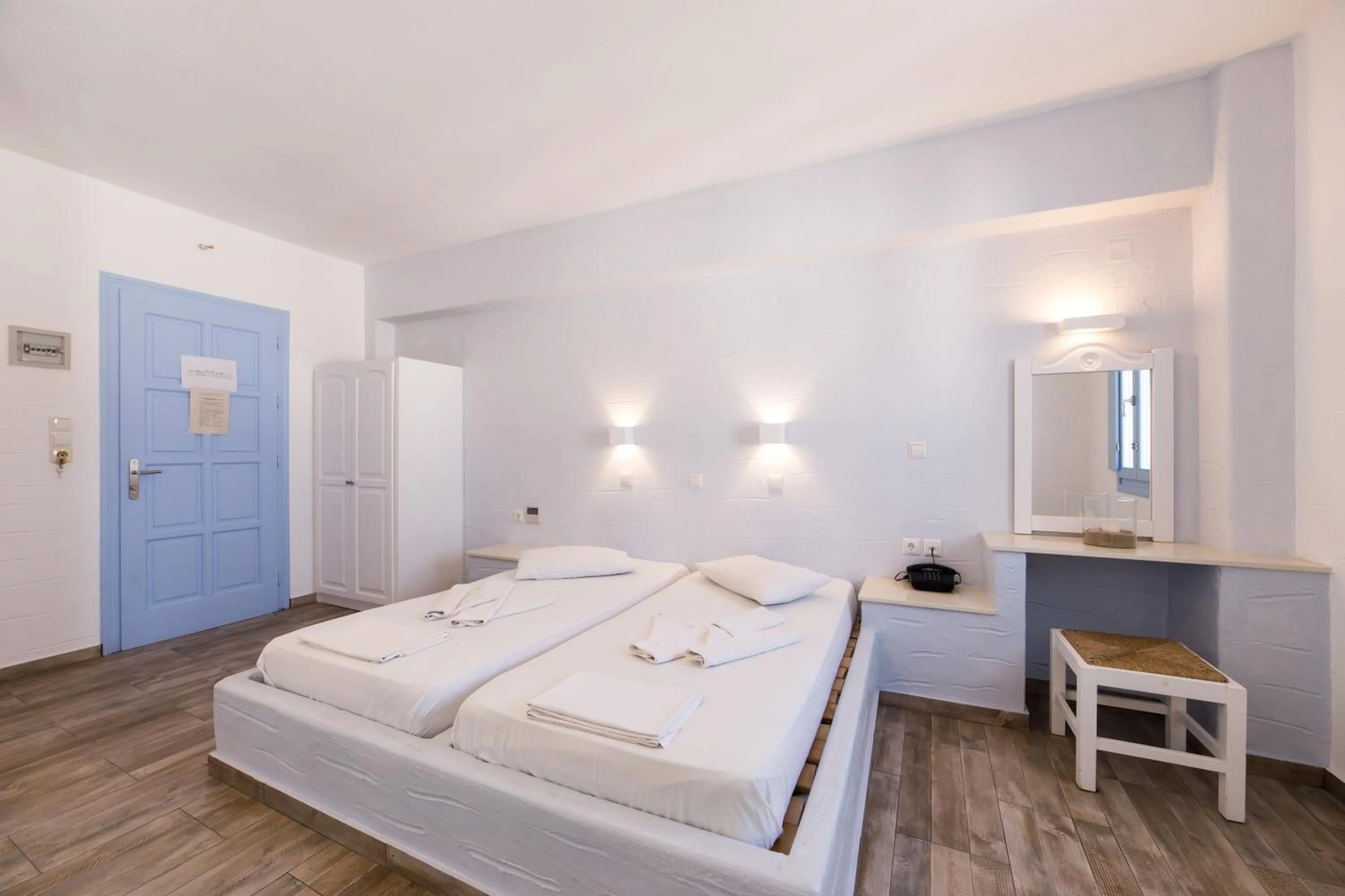 Bed in Stratos Apartments & Studios