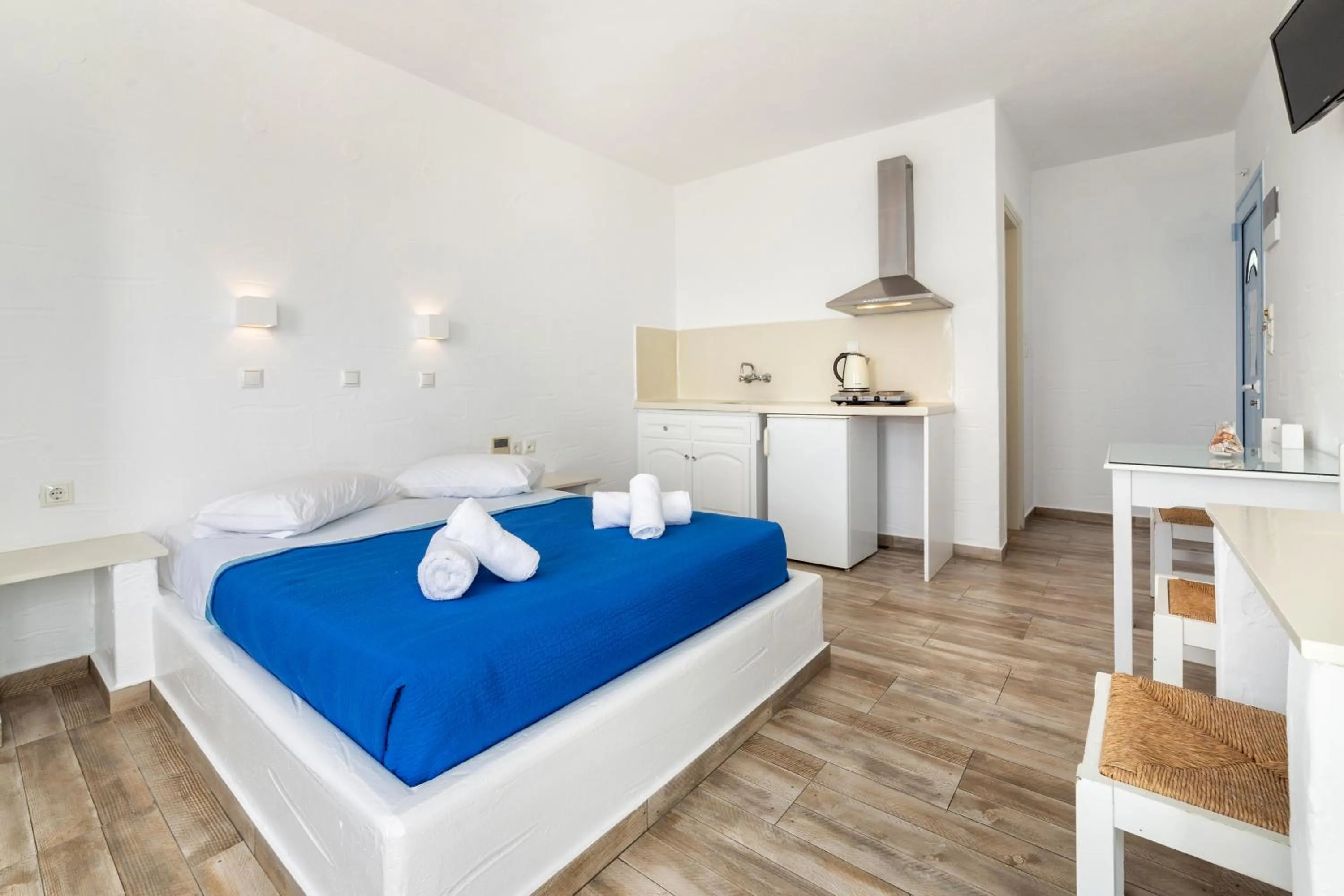 Bed in Stratos Apartments & Studios