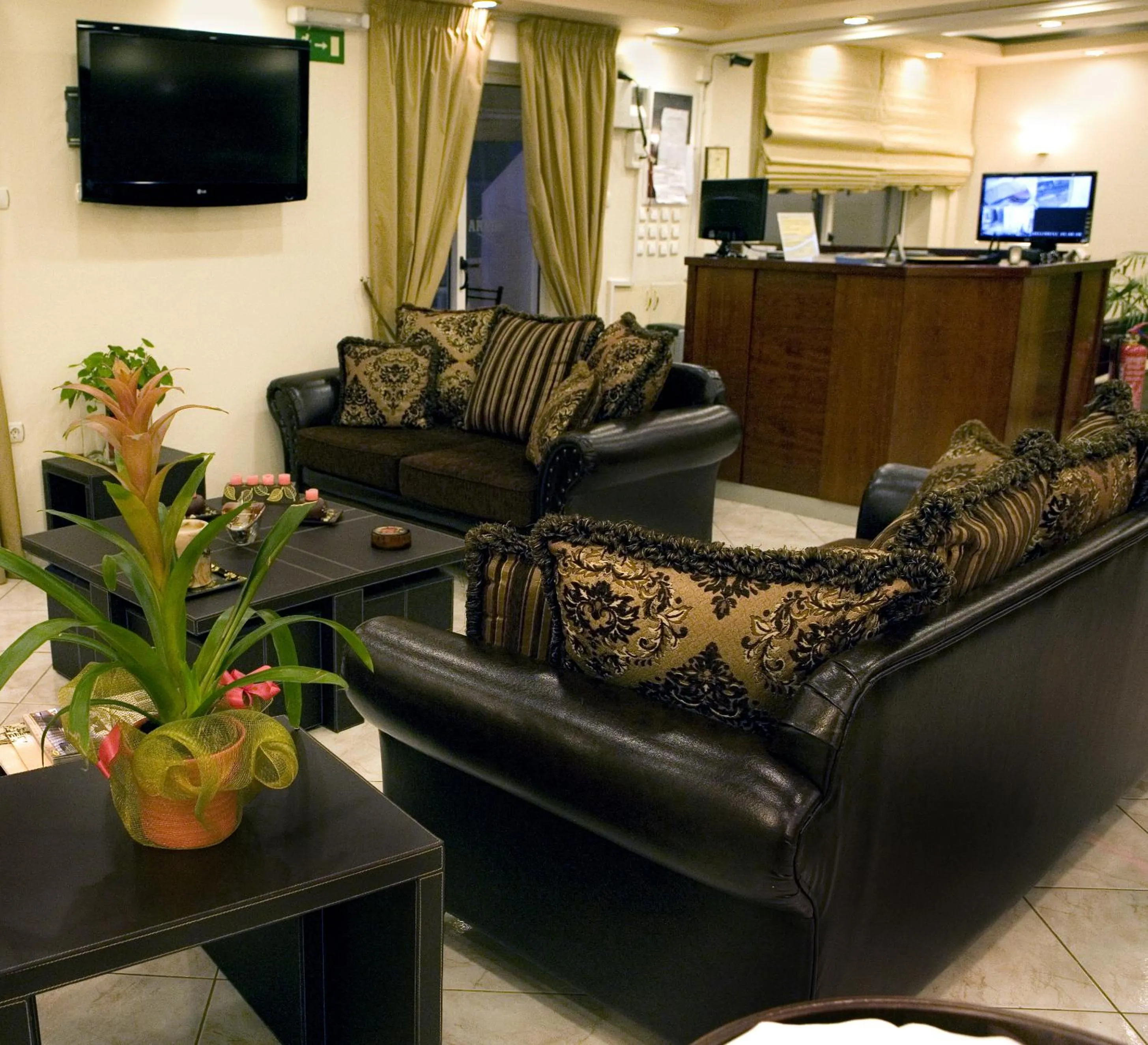 Communal lounge/ TV room in Archontiki City Hotel