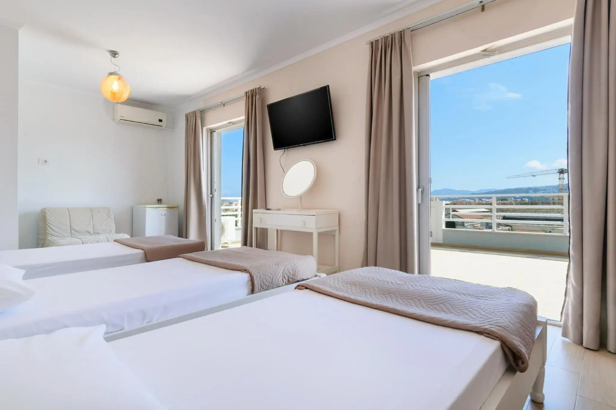 TV and multimedia, Bed in Archontiki City Hotel TV and multimedia, Bed in Archontiki City Hotel