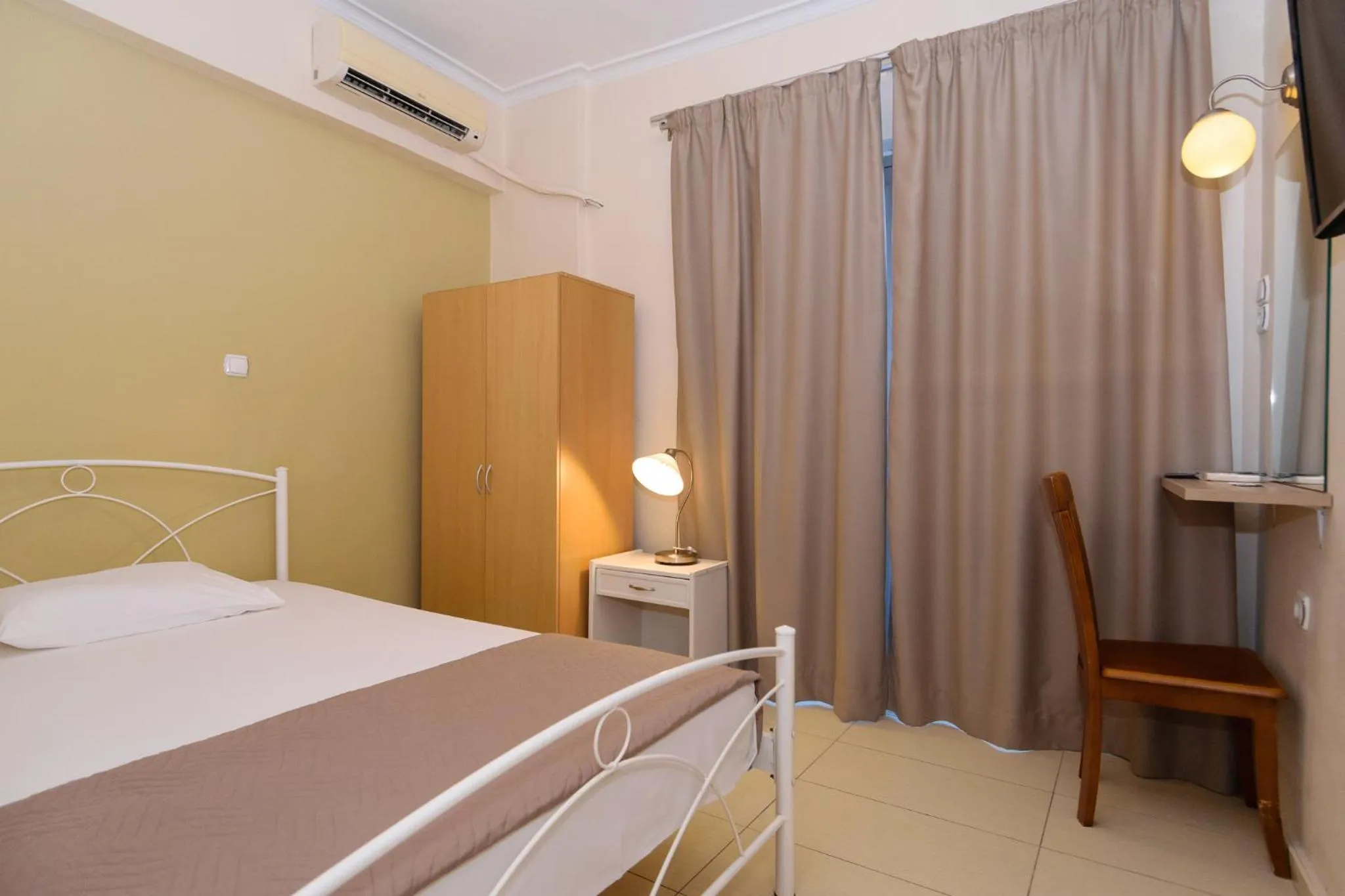 Bed in Archontiki City Hotel