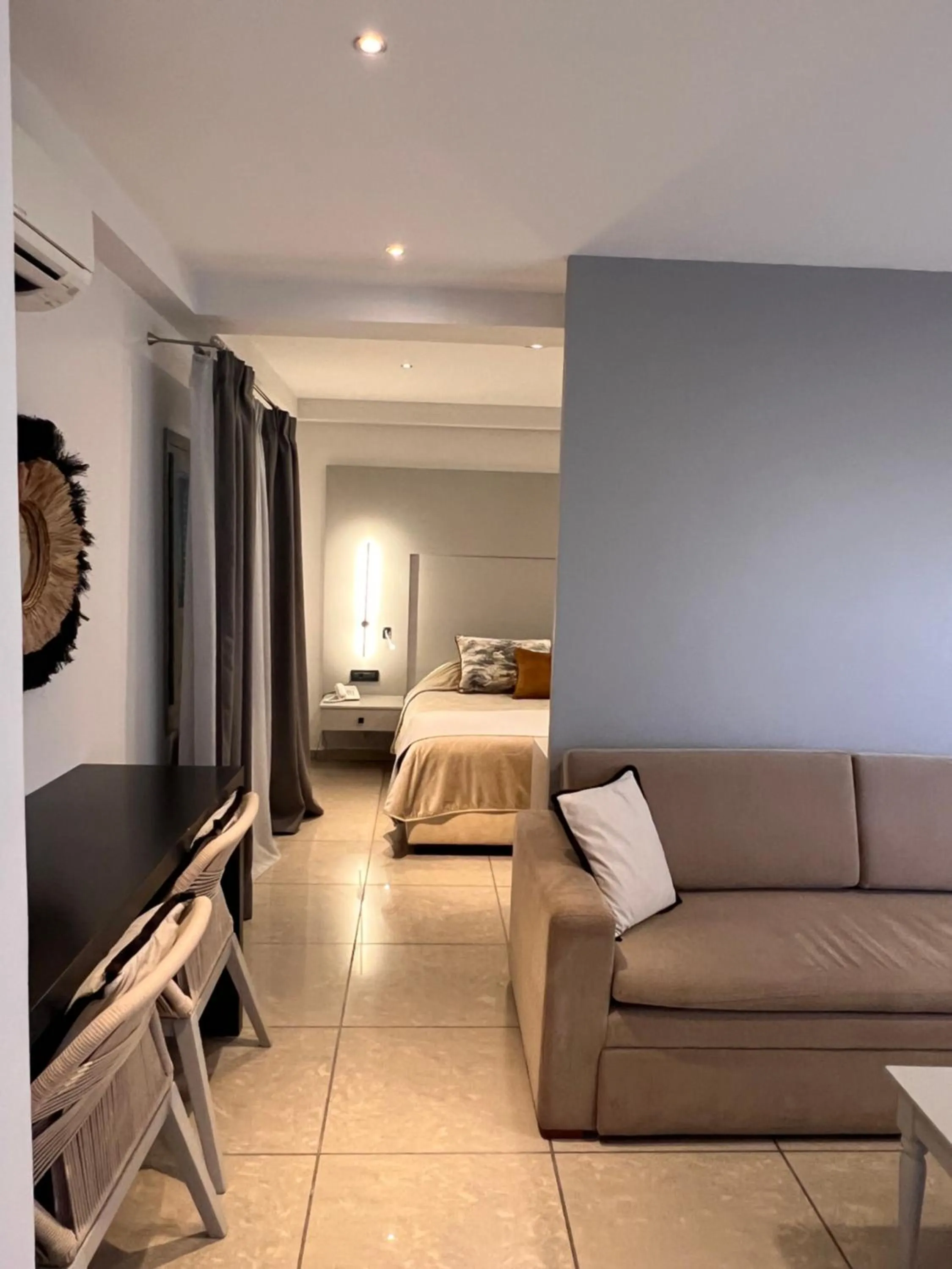 Bed in Theoxenia Caldera Hotel