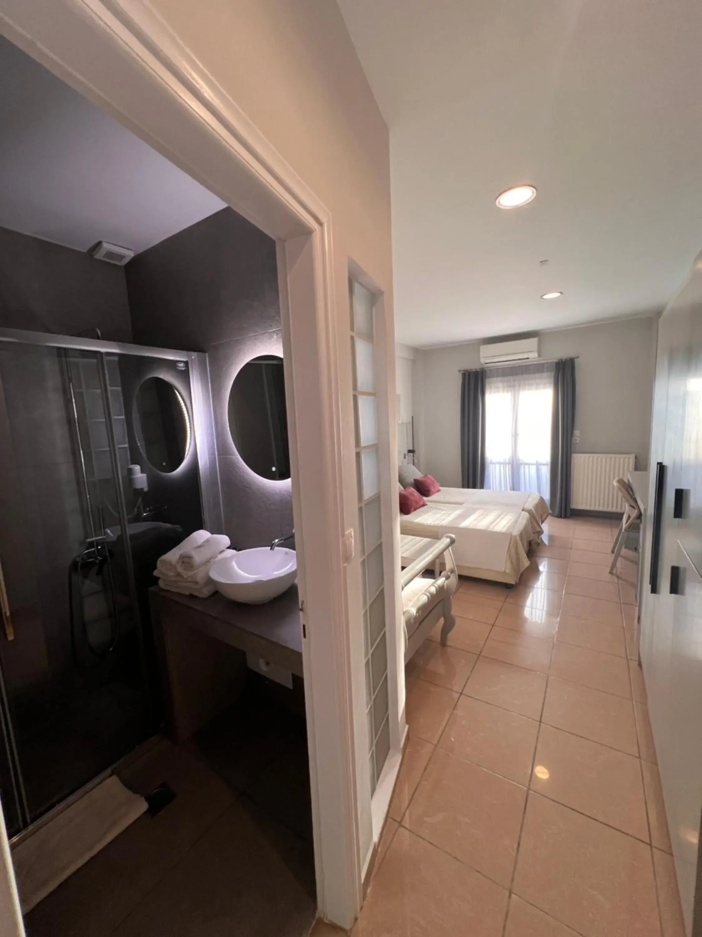 Bed in Theoxenia Caldera Hotel Bed in Theoxenia Caldera Hotel