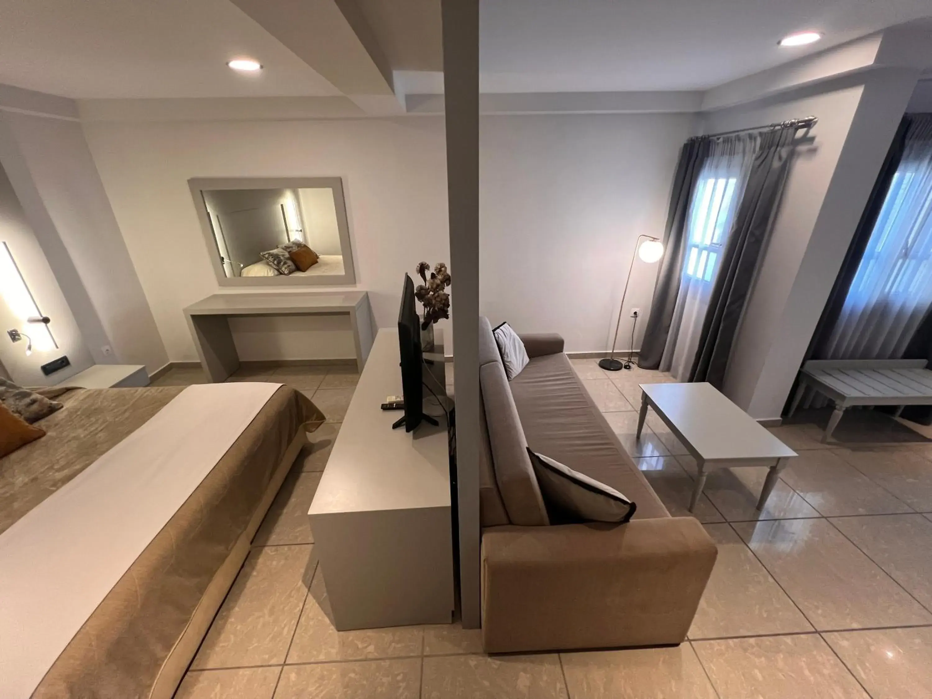 Bed in Theoxenia Caldera Hotel Bed in Theoxenia Caldera Hotel