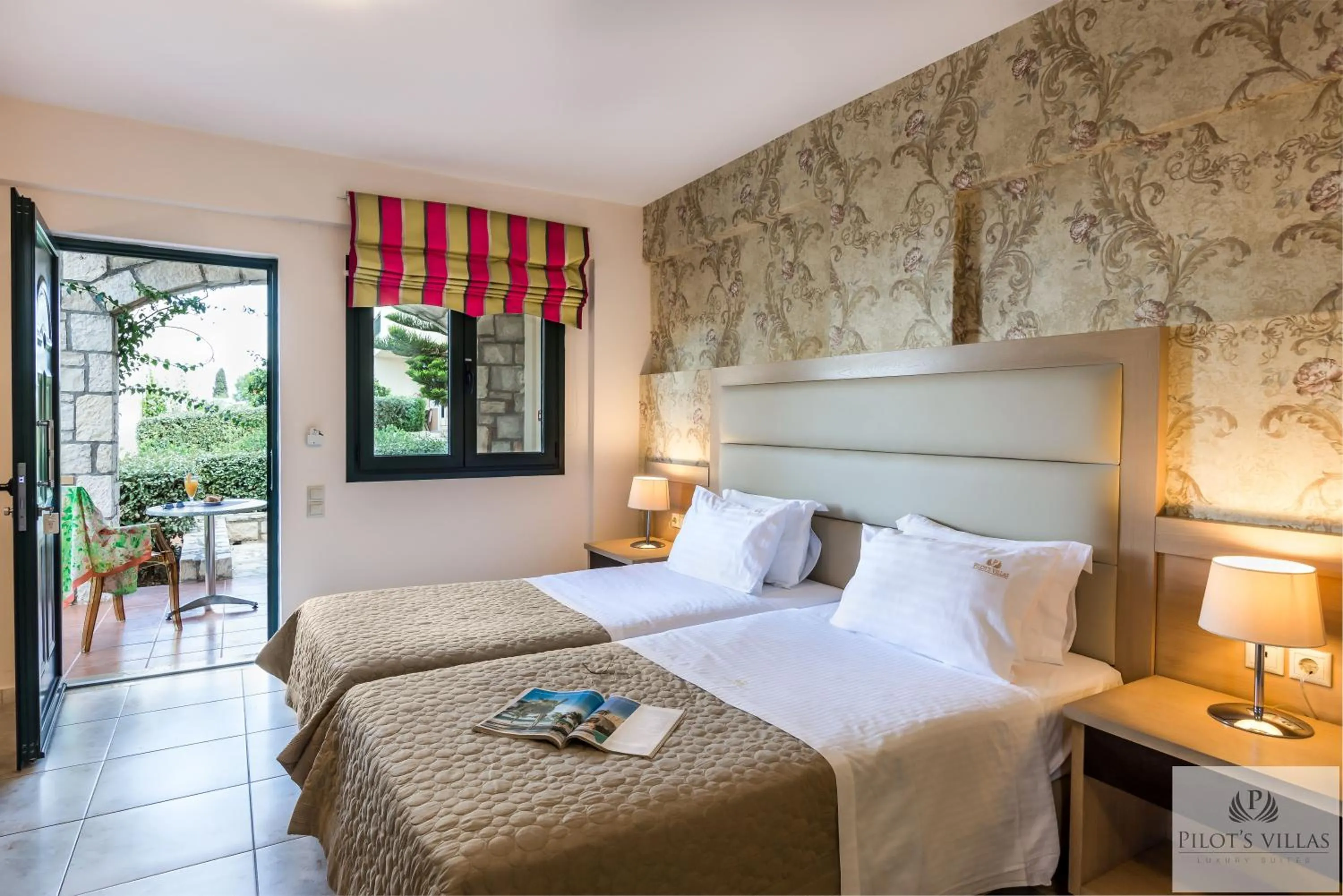 Bed in Pilot's Villas Luxury Suites