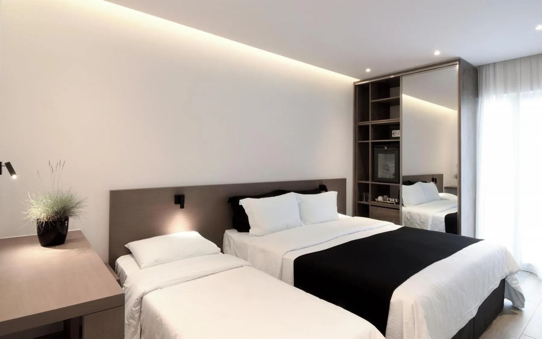 Bed in Poseidon Athens Hotel