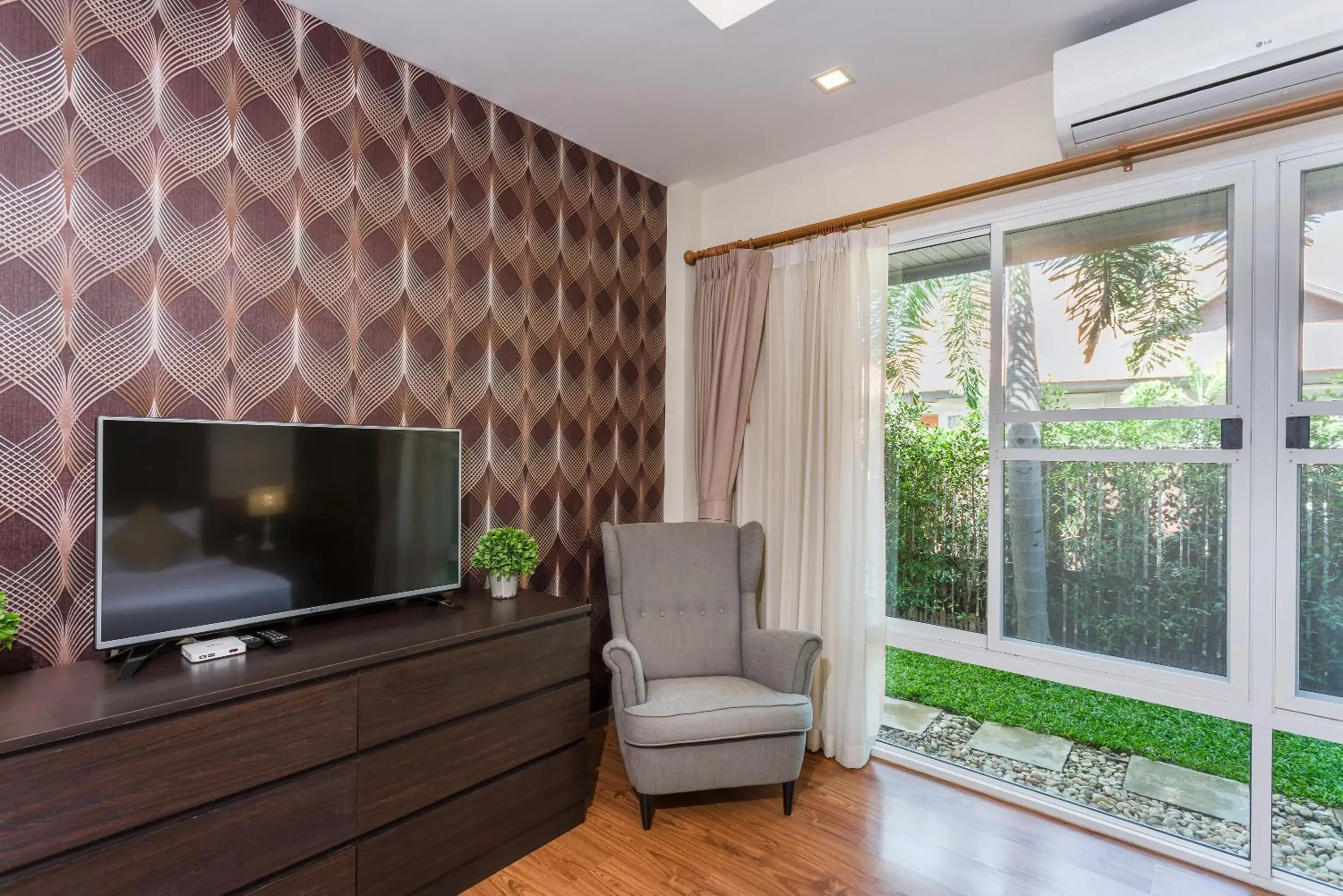 Bedroom, TV/Entertainment Center in The Ville Pool Villa Jomtien A23