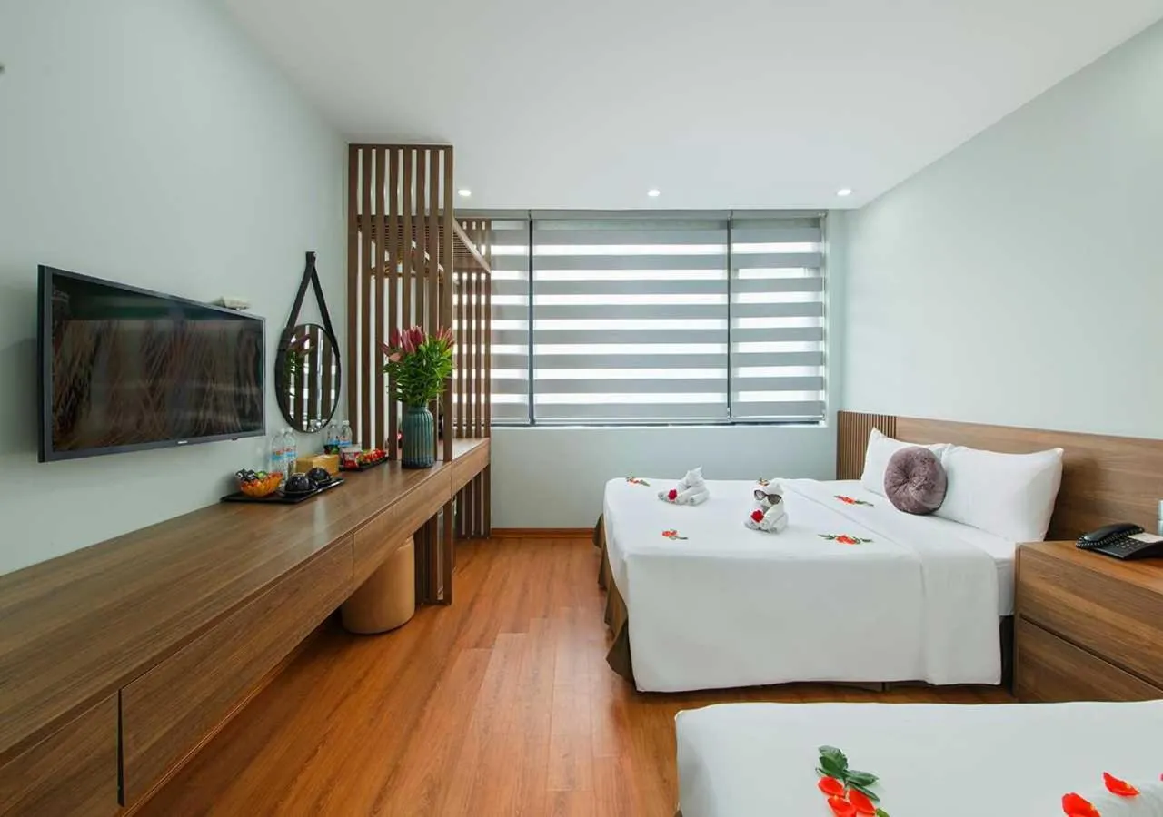 Photo of the whole room, Bed in Family Hanoi Hotel