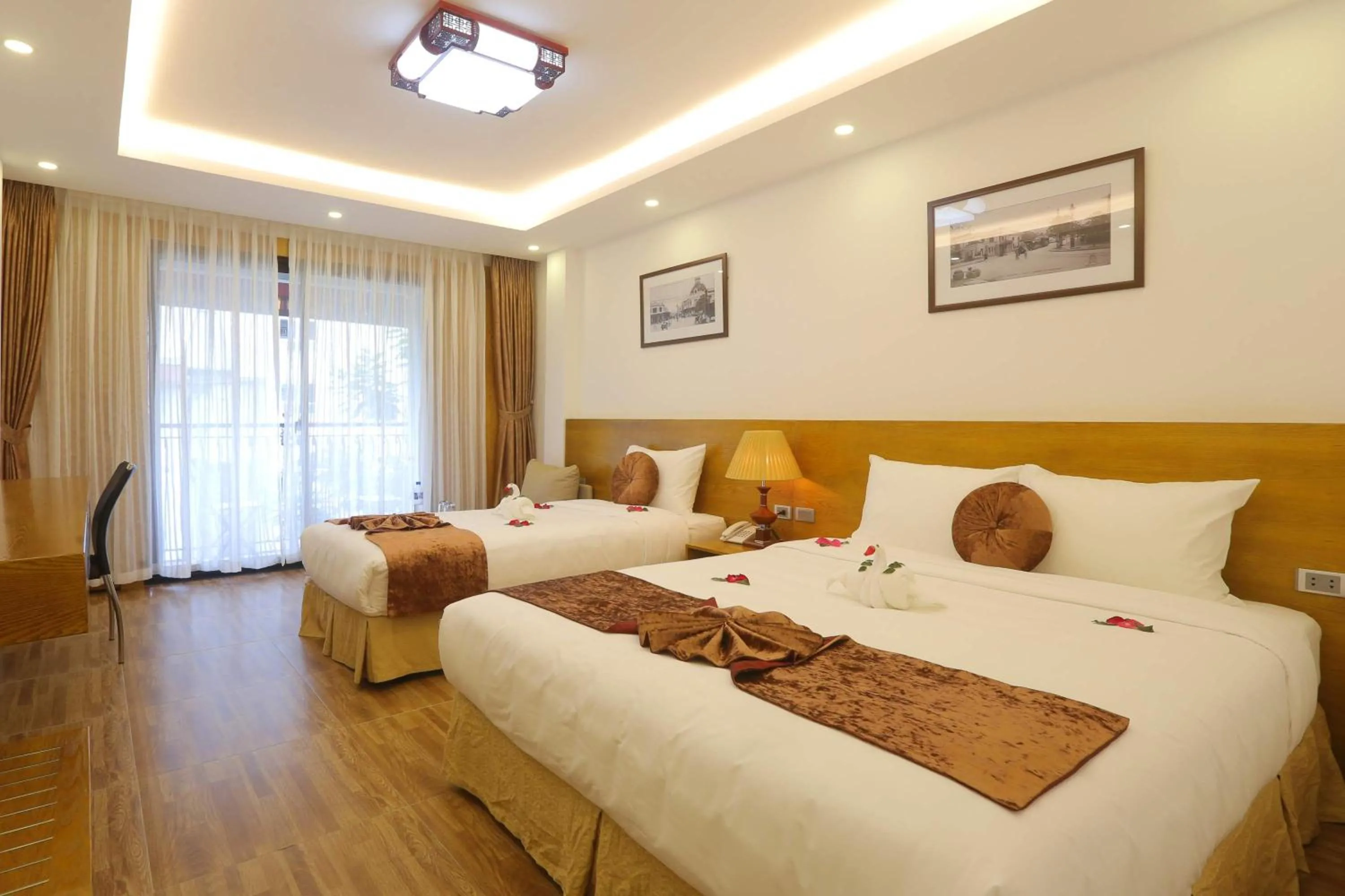 Photo of the whole room, Bed in Family Hanoi Hotel