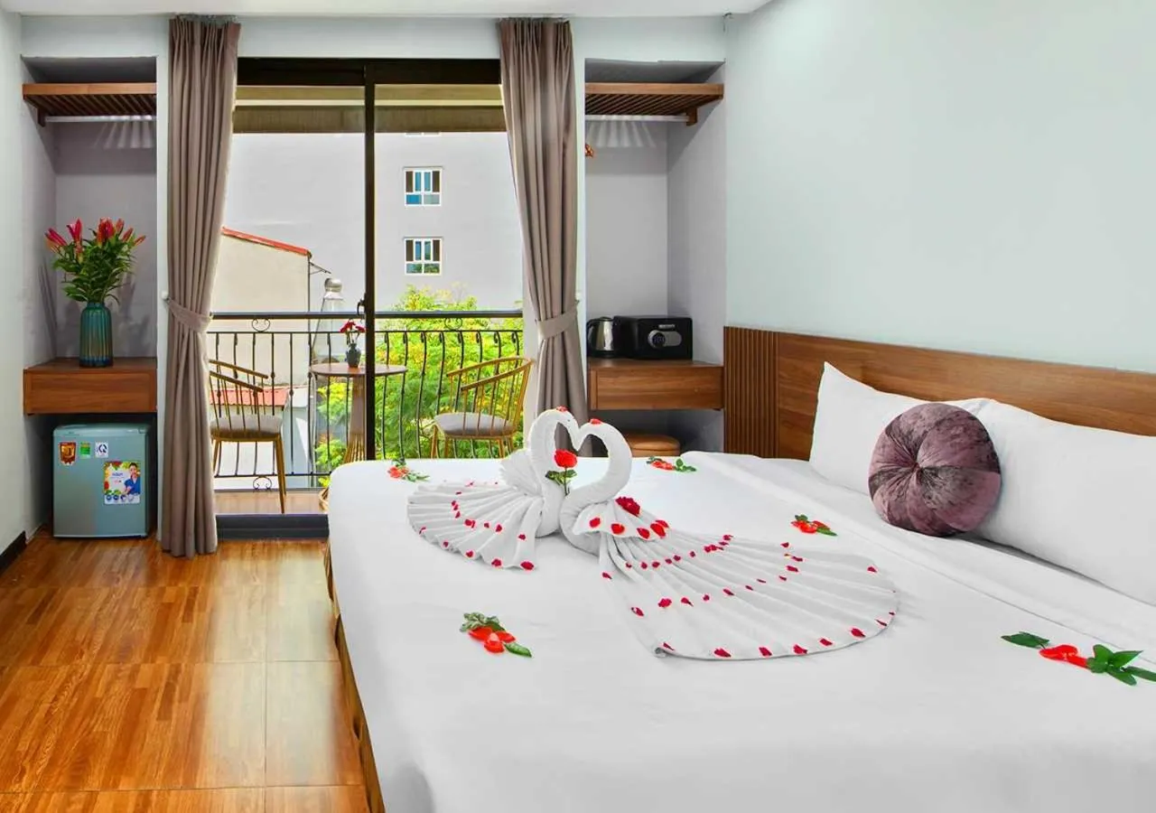 Bed in Family Hanoi Hotel