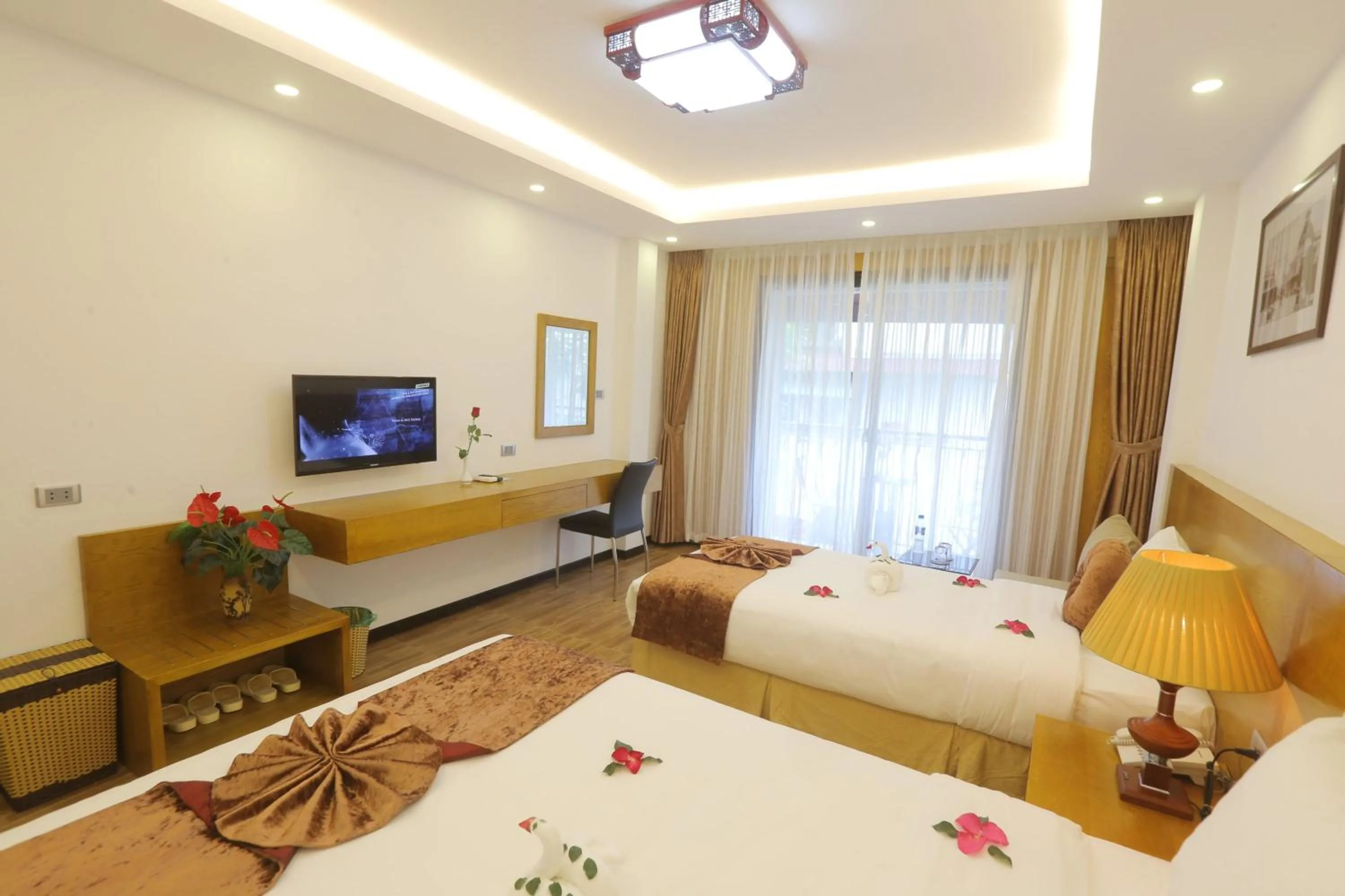 Photo of the whole room, Bed in Family Hanoi Hotel