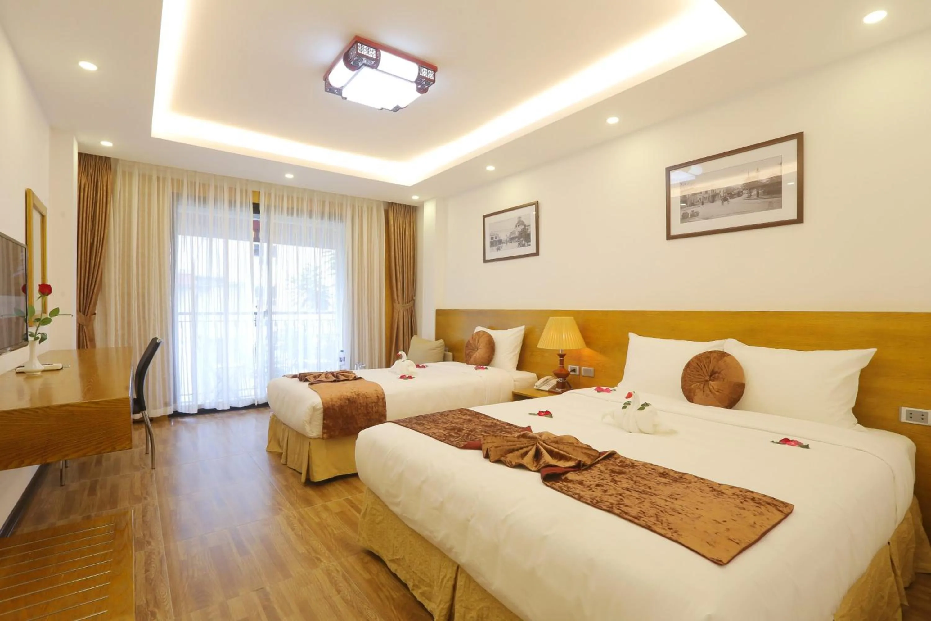 Photo of the whole room, Bed in Family Hanoi Hotel