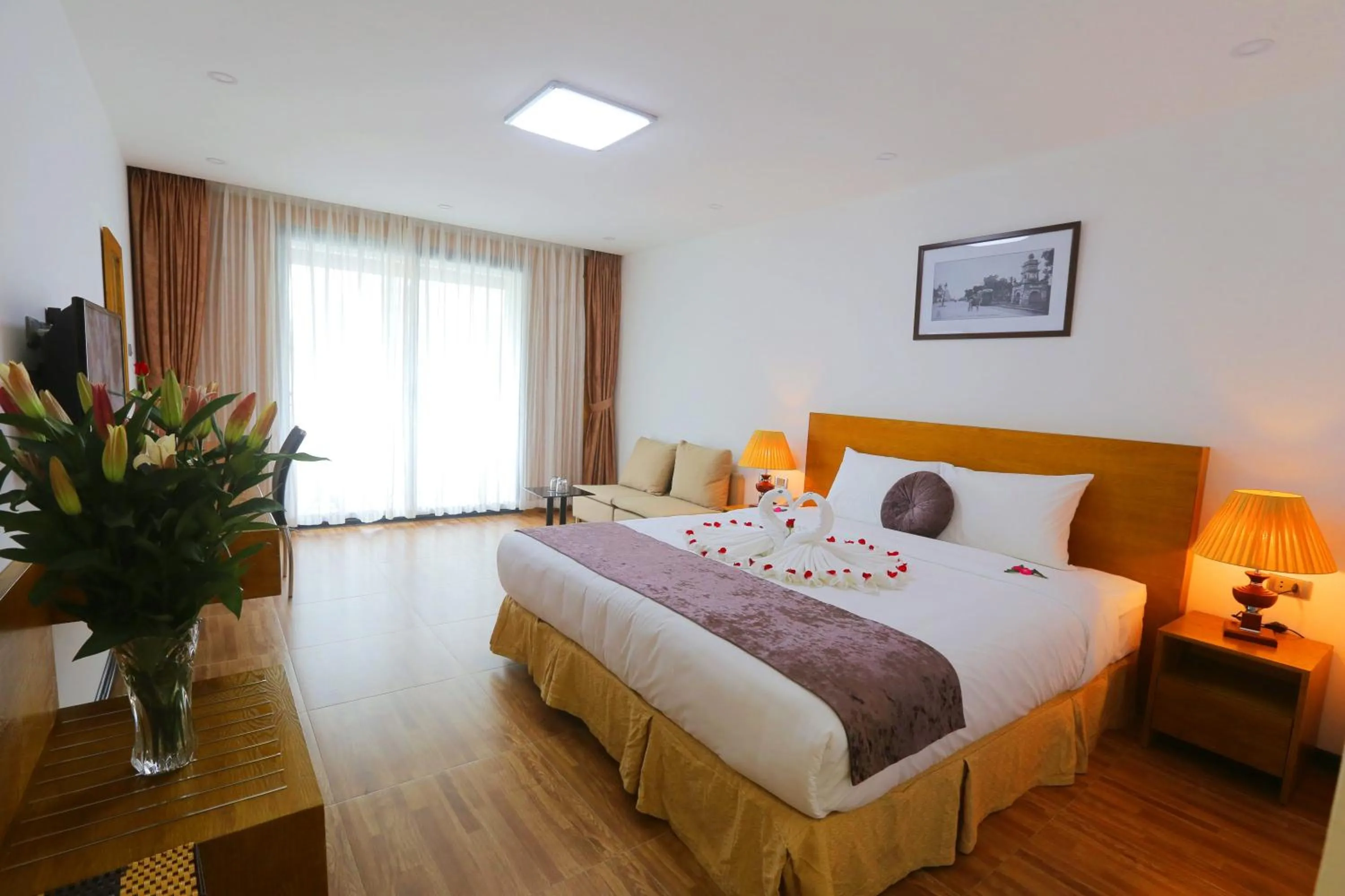 Photo of the whole room, Bed in Family Hanoi Hotel