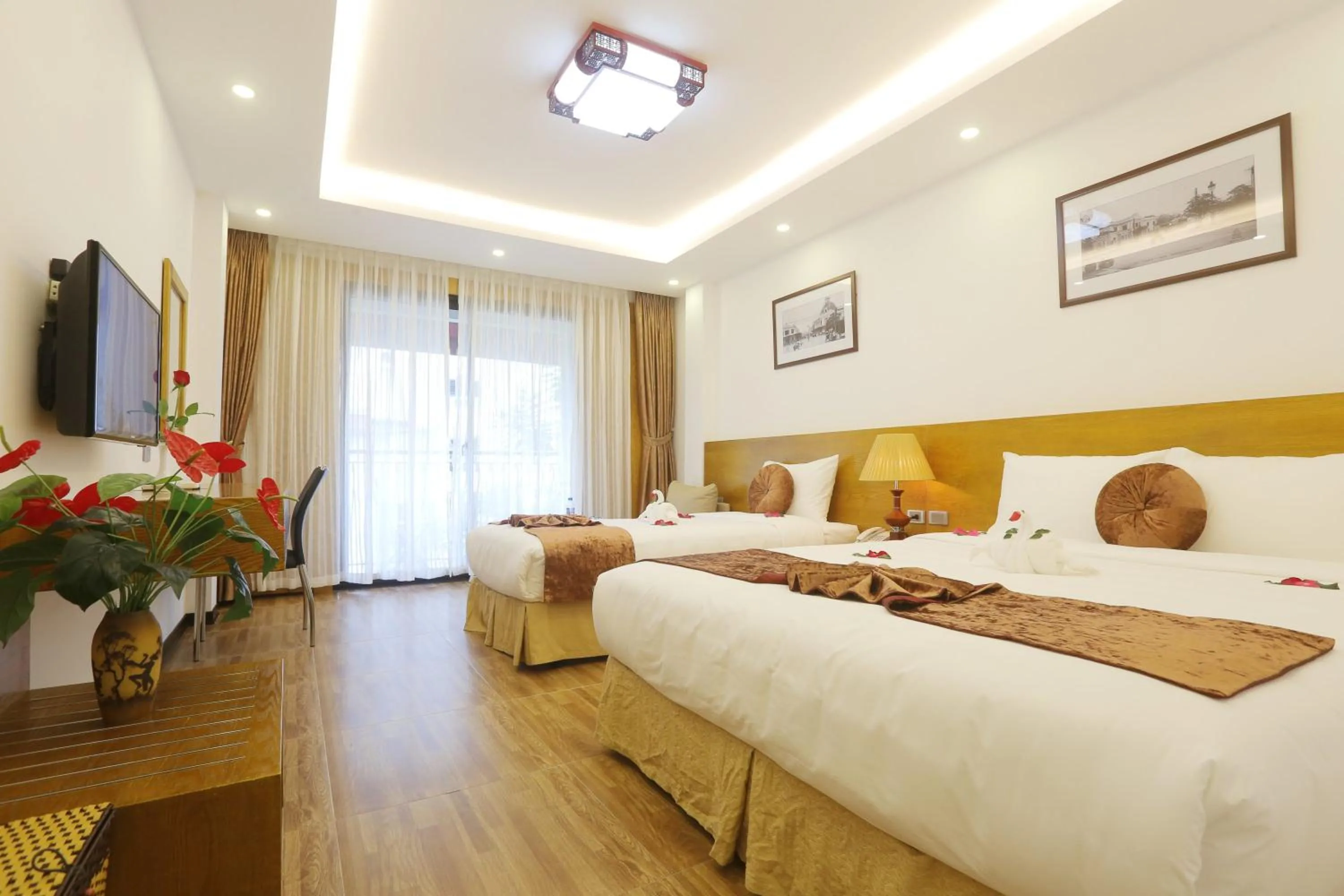 Photo of the whole room, Bed in Family Hanoi Hotel