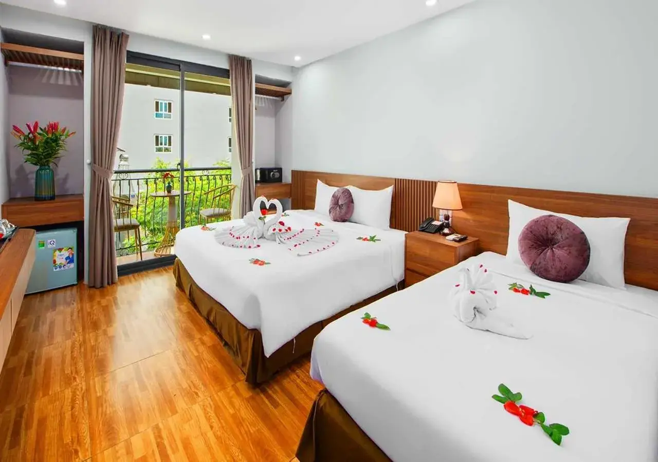 Family Room with Balcony in Family Hanoi Hotel Family Room with Balcony in Family Hanoi Hotel